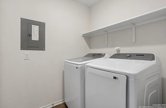 a utility room with dryer and washer