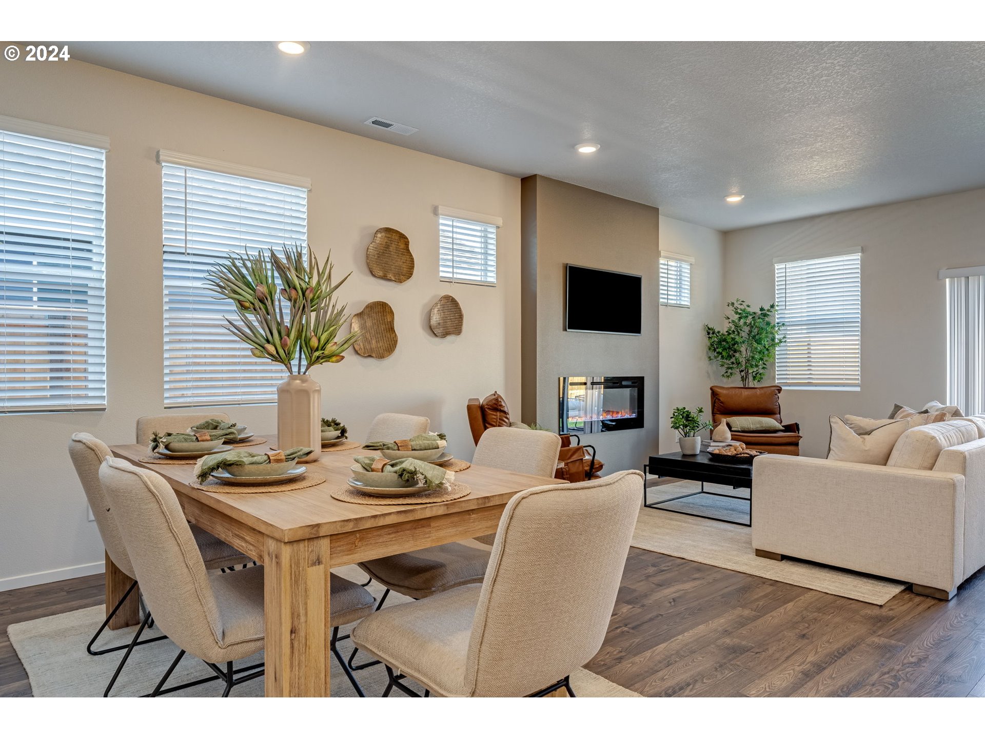 2760 U Street Springfield, OR 97477 - Photo 11 of 48 a living room with fireplace furniture and a flat screen tv
