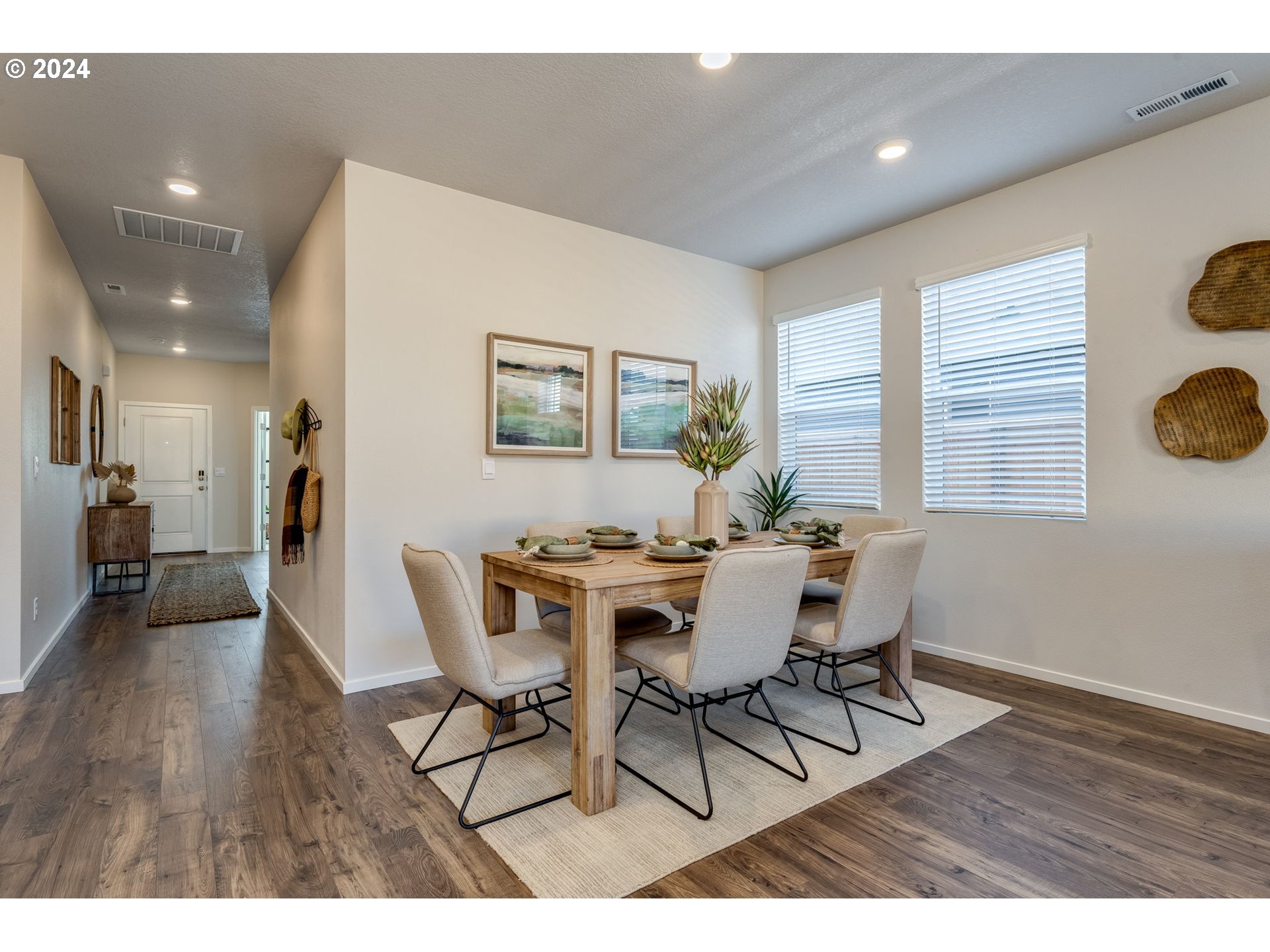 2760 U Street Springfield, OR 97477 - Photo 14 of 48 a view of a dining room with furniture and wooden floor