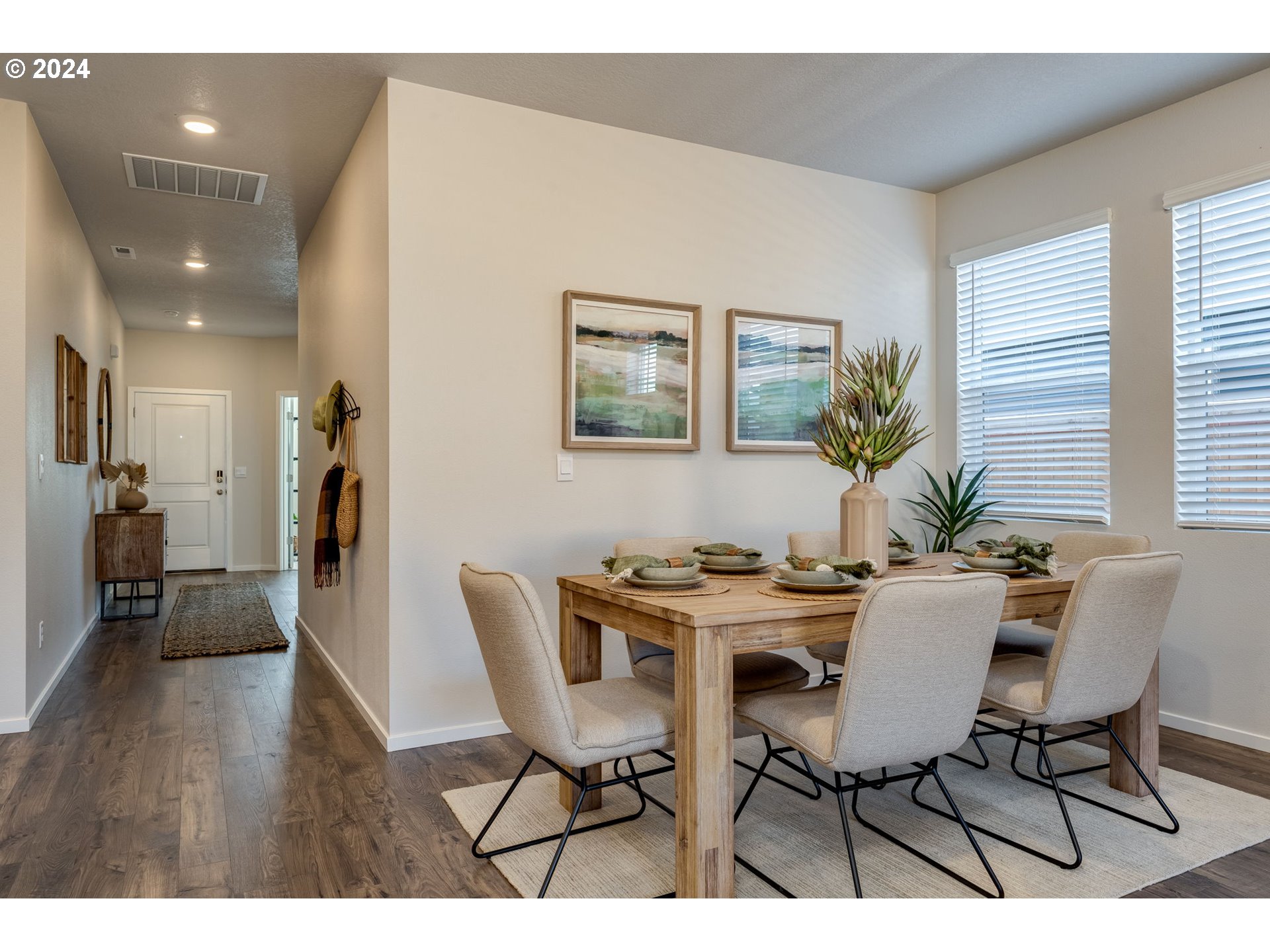 2760 U Street Springfield, OR 97477 - Photo 15 of 48 a view of a dining room with furniture and wooden floor