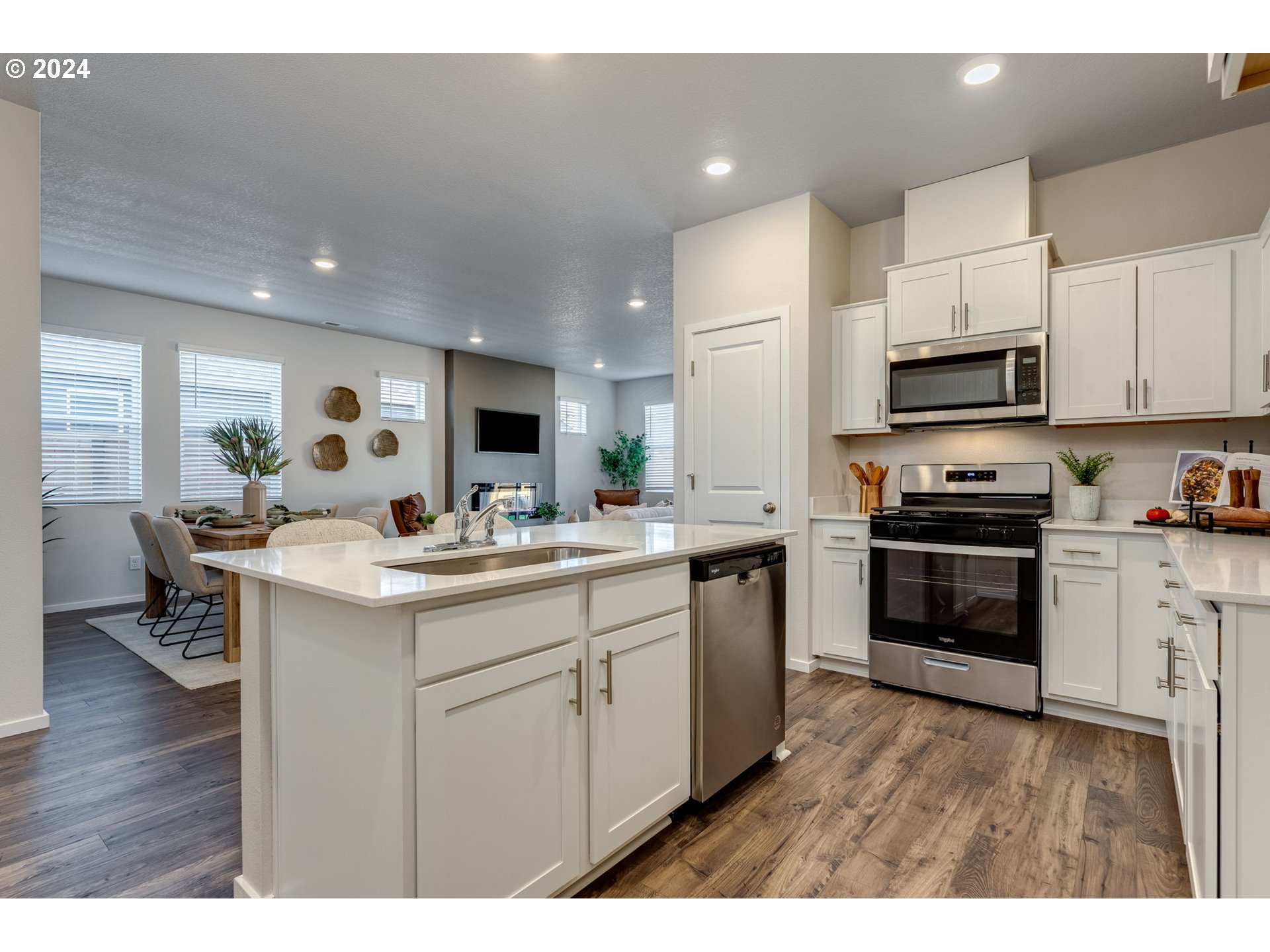 2760 U Street Springfield, OR 97477 - Photo 21 of 48 a kitchen with a sink cabinets and wooden floor