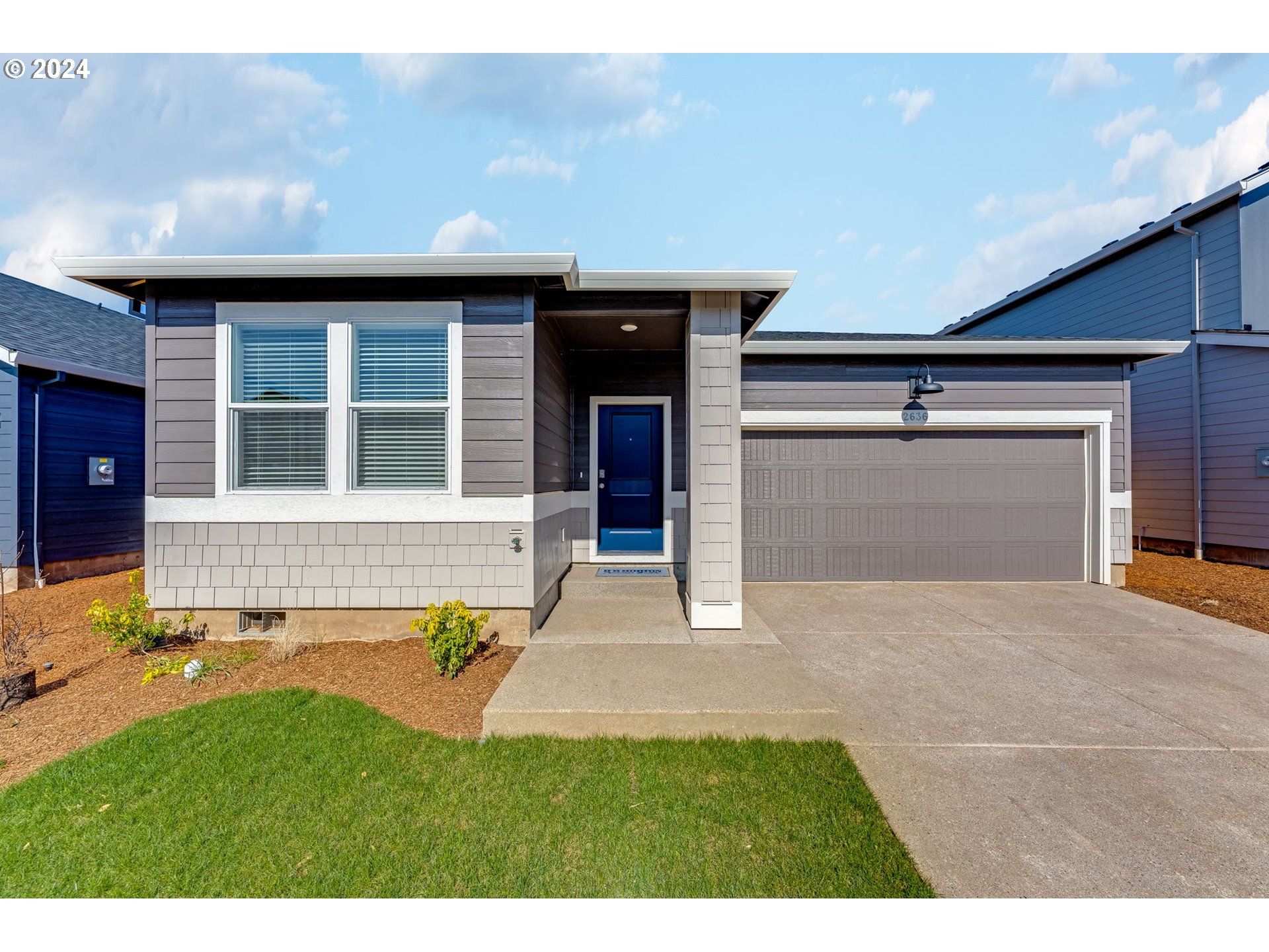 2760 U Street Springfield, OR 97477 - Photo 3 of 48 a house view with a garden space