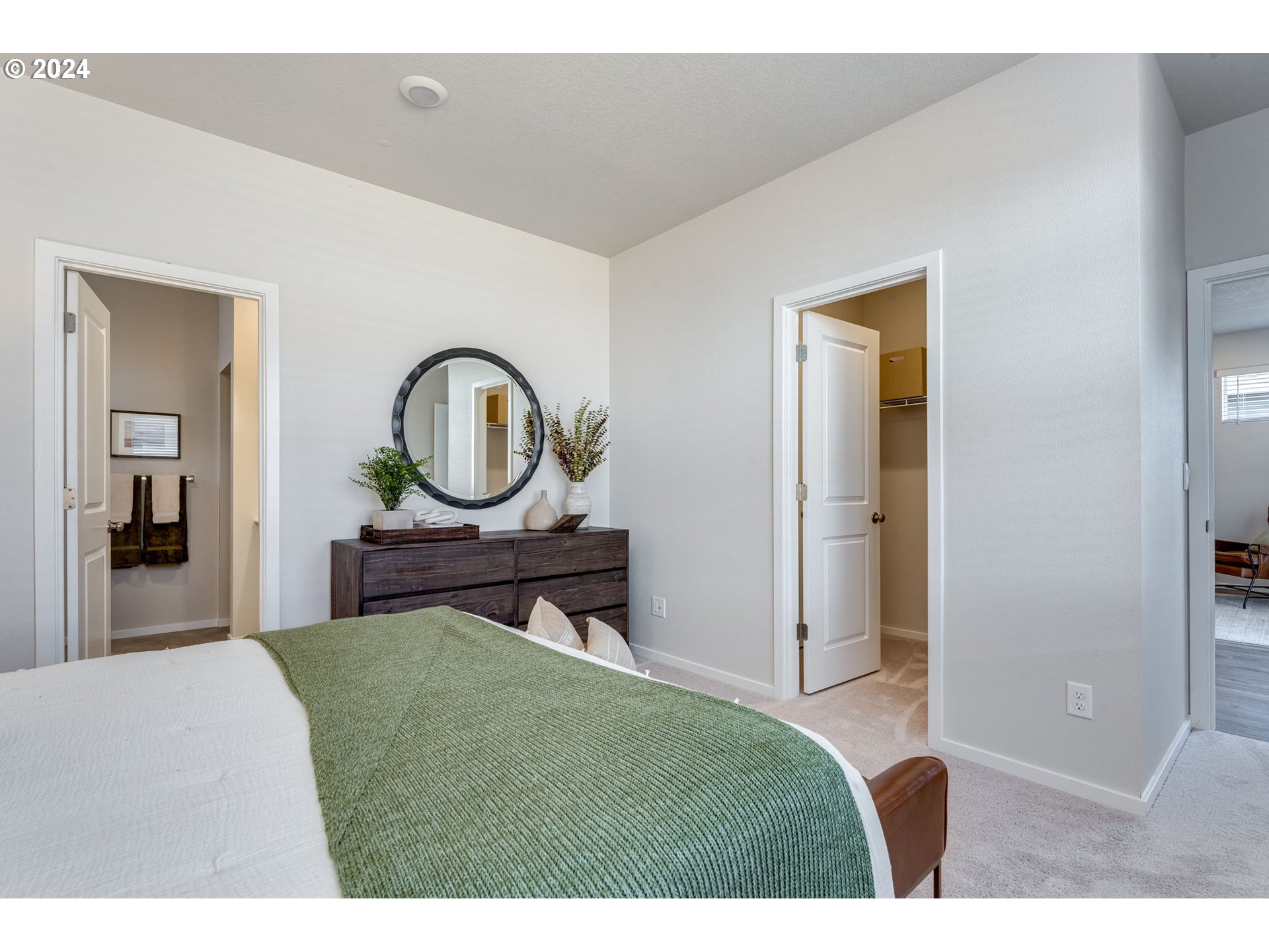 2760 U Street Springfield, OR 97477 - Photo 33 of 48 a bedroom with a bed and a mirror