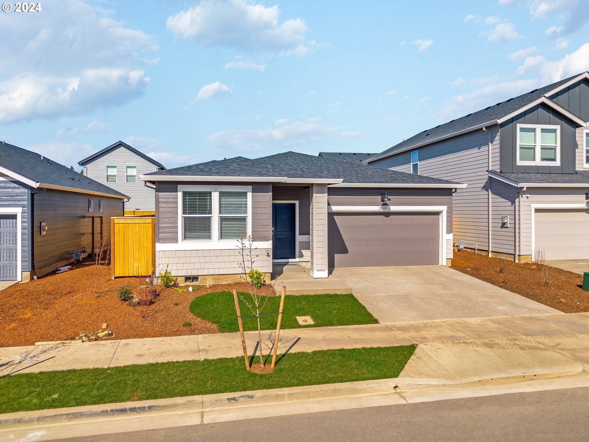 2760 U Street Springfield, OR 97477 - Photo 35 of 48 a front view of a house with swimming pool and porch