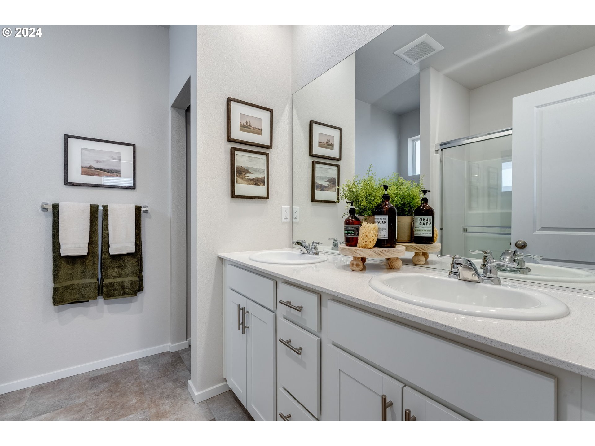 2760 U Street Springfield, OR 97477 - Photo 36 of 48 a bathroom with a sink and a mirror