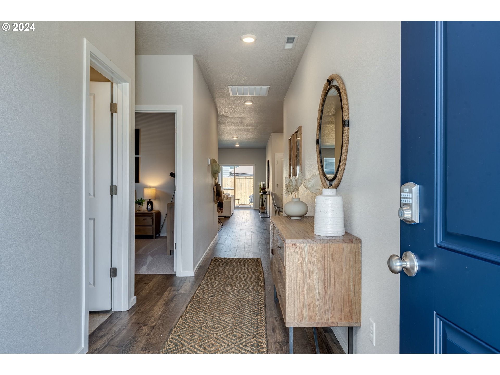 2760 U Street Springfield, OR 97477 - Photo 4 of 48 a view of entryway and hall with wooden floor