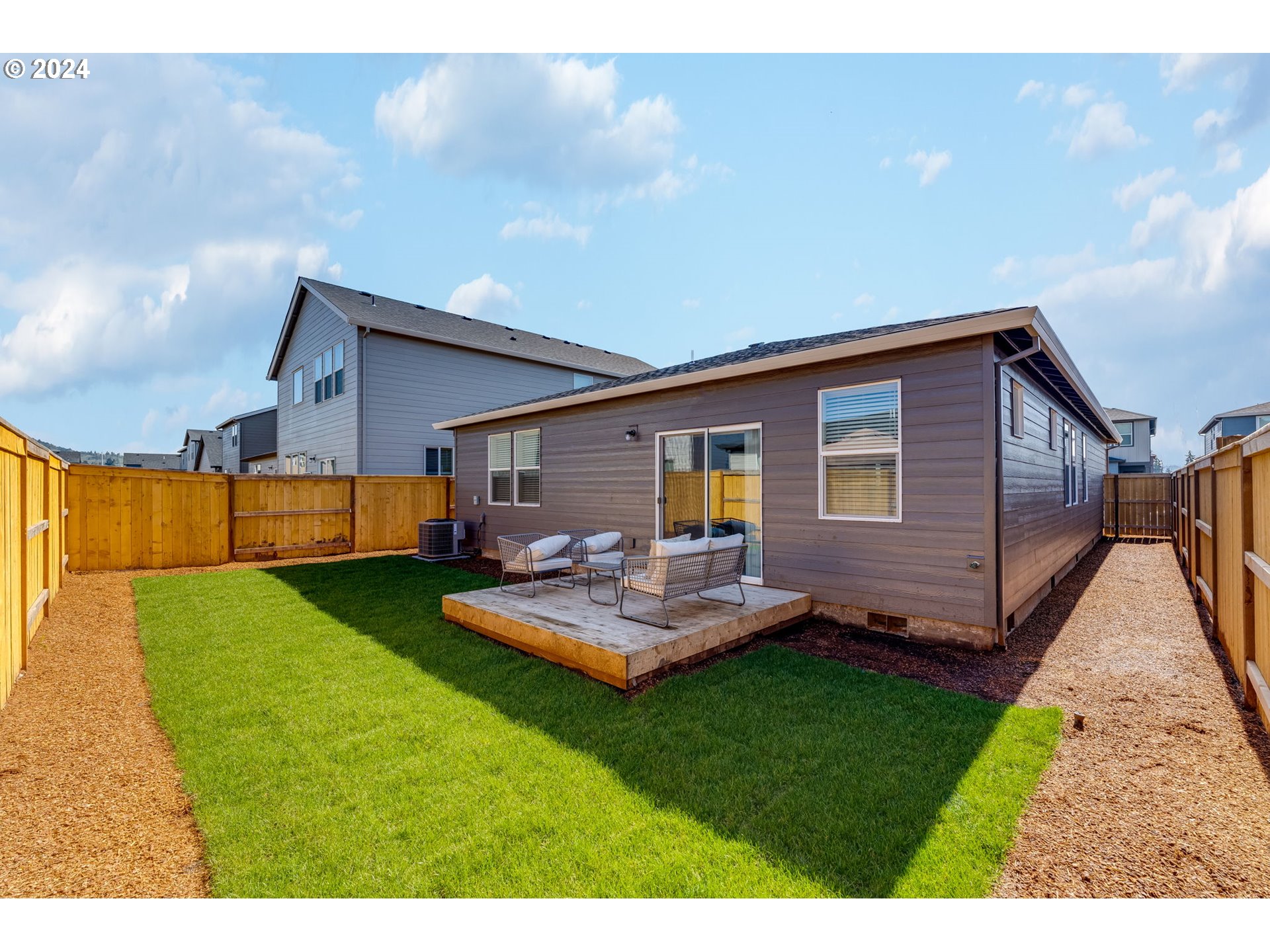 2760 U Street Springfield, OR 97477 - Photo 45 of 48 a front view of house with a garden and patio
