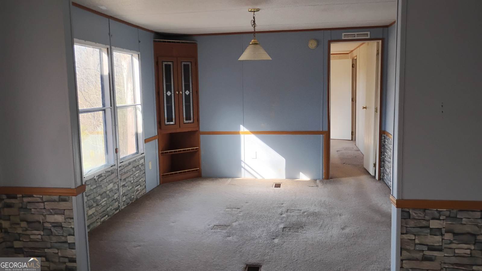 2331 Kesler Road Carnesville, GA 30521 - Photo 26 of 50 a view of empty room with large windows
