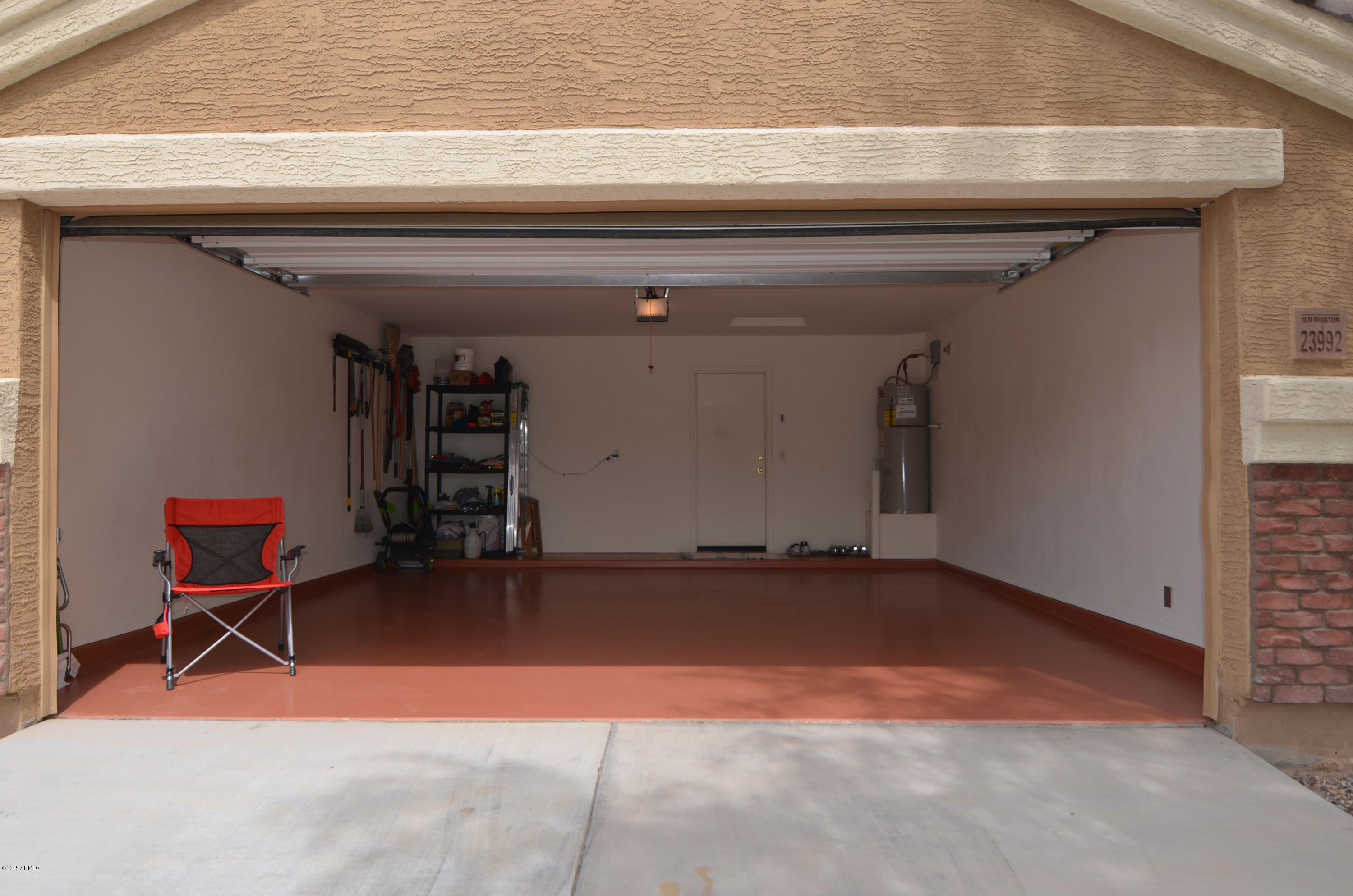 23992 West Pecan Road Buckeye, AZ 85326 - Photo 5 of 34 Open Garage-from-driveway.jpg