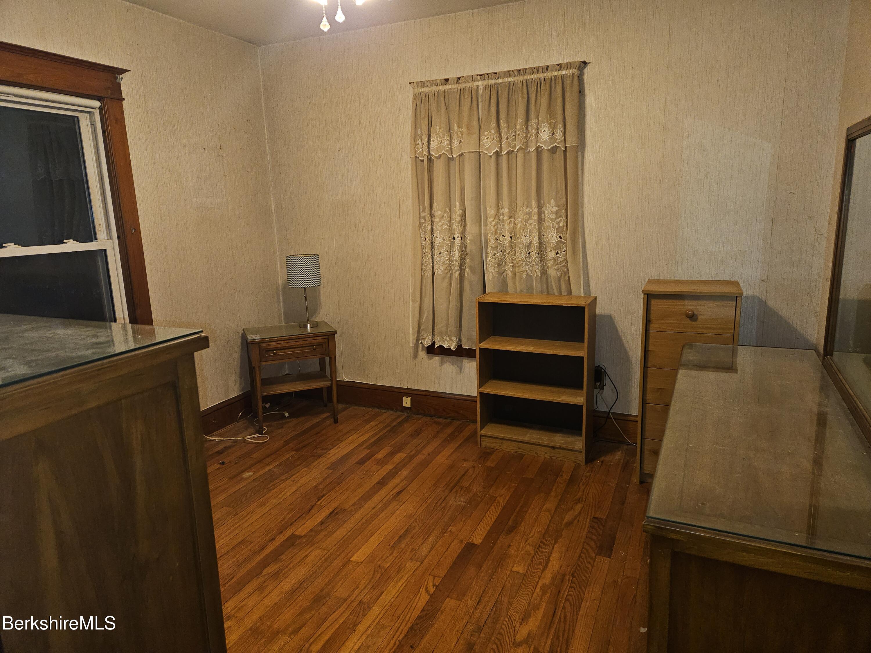 269 2nd Street Pittsfield, MA 01201 - Photo 23 of 39 a bedroom with a bed and a window