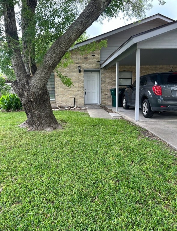 a view of a house with a garden