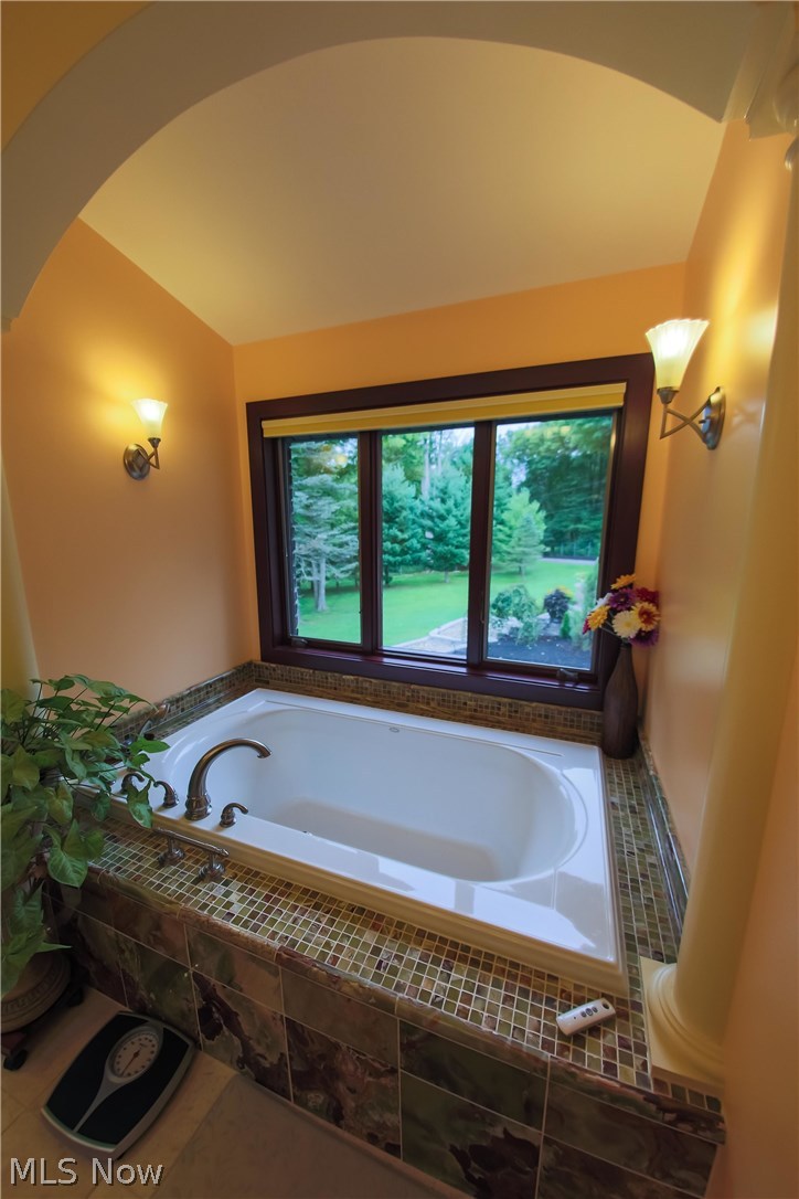 6290 Riverview Road Peninsula, OH 44264 - Photo 19 of 35 Master bedroom alcove jetted tub w/ custom Onyx tiled surround