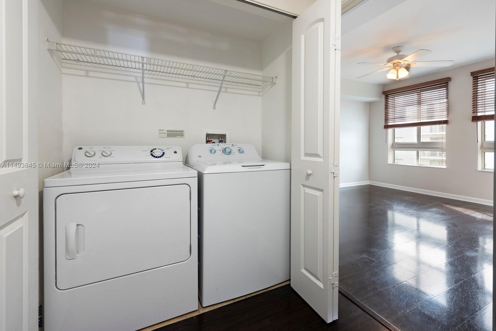 7355 Southwest 89th Street, Unit 510N Miami, FL 33156 - Photo 26 of 52 a utility room with dryer and washer