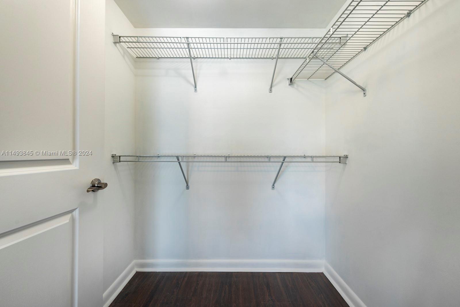 7355 Southwest 89th Street, Unit 510N Miami, FL 33156 - Photo 29 of 52 a view of a room with racks on the wall