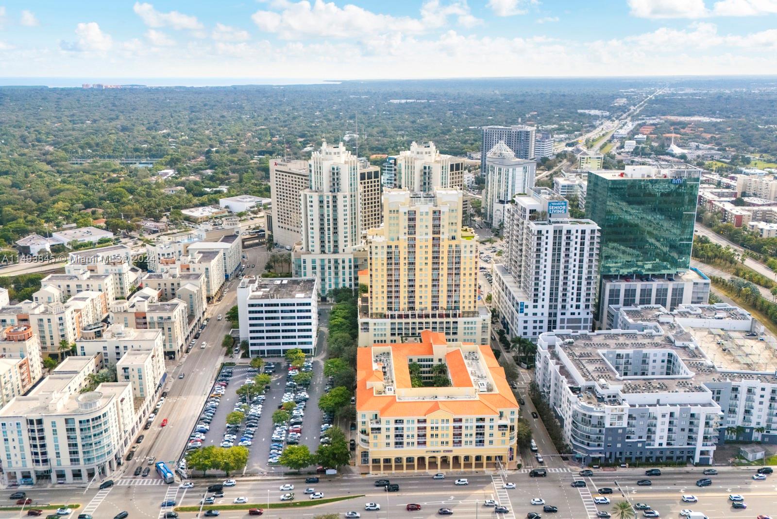 7355 Southwest 89th Street, Unit 510N Miami, FL 33156 - Photo 44 of 52 a view of a city with tall buildings