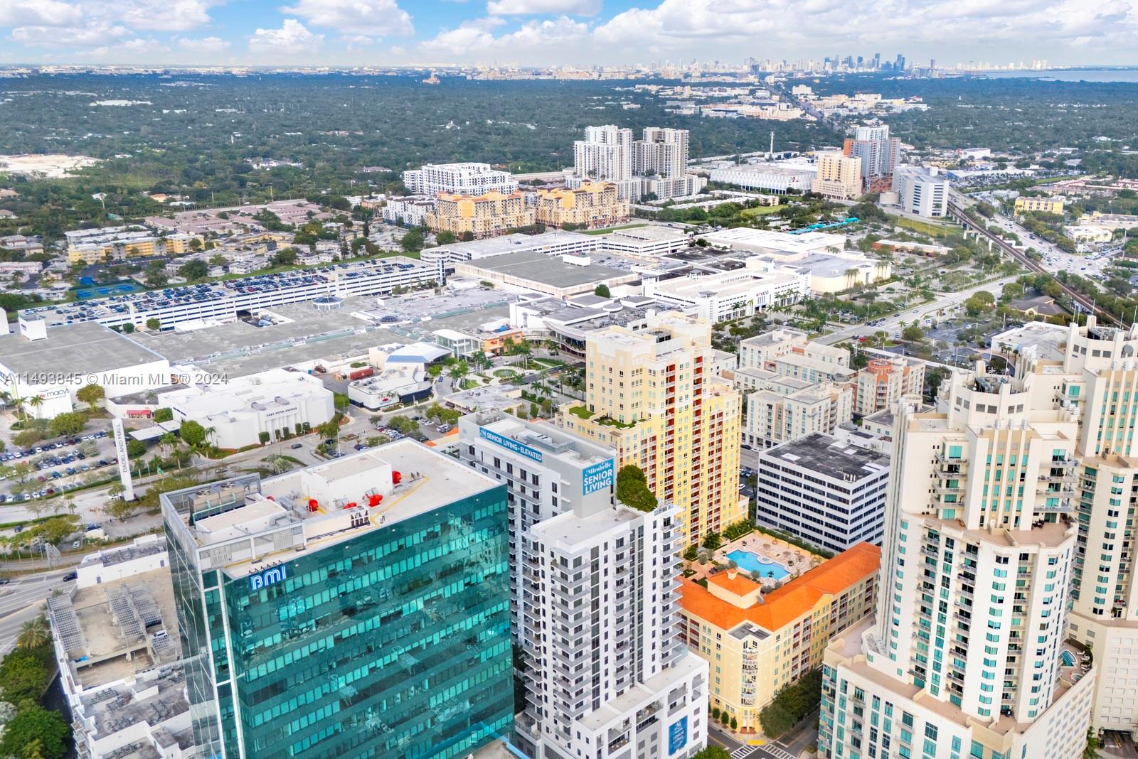 7355 Southwest 89th Street, Unit 510N Miami, FL 33156 - Photo 46 of 52 an aerial view of residential houses with outdoor space