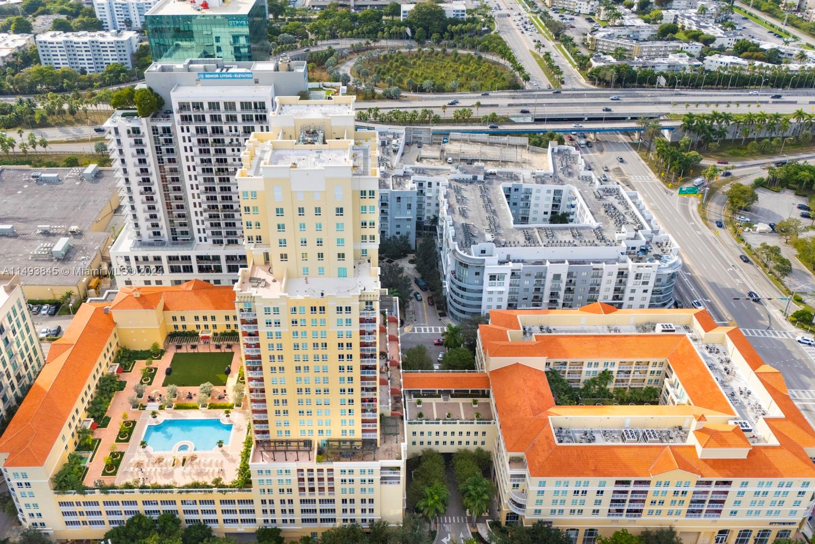 7355 Southwest 89th Street, Unit 510N Miami, FL 33156 - Photo 47 of 52 a view of swimming pool with outdoor seating