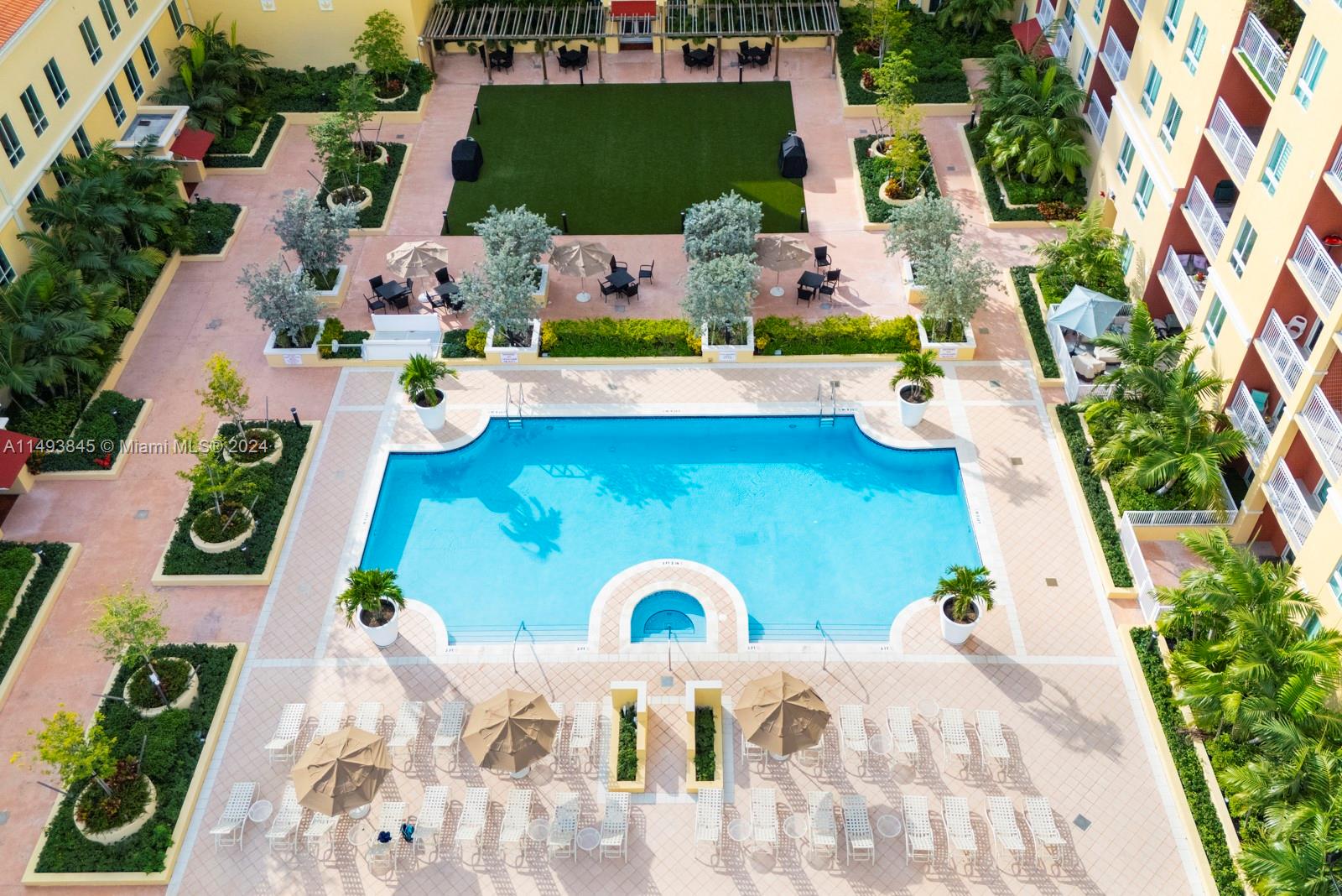 7355 Southwest 89th Street, Unit 510N Miami, FL 33156 - Photo 51 of 52 an aerial view of a house with a garden
