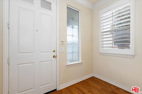 a view of a room that has a window in it