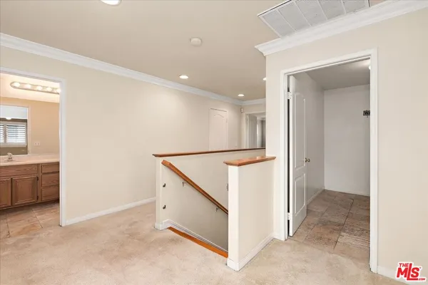 a view of a hallway with entryway