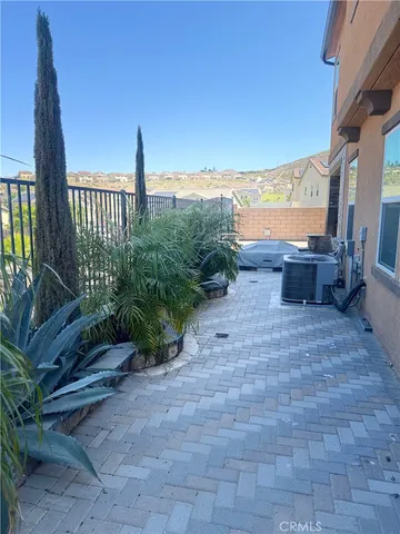 a view of a terrace with couches
