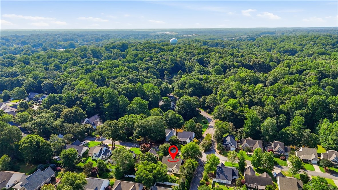 101 Grand Oak Circle Pendleton, SC 29670 - Photo 38 of 40 An aerial perspective reveals a vibrant neighborhood nestled among verdant trees and abundant green spaces.