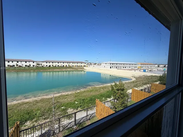 a view of a lake from a window