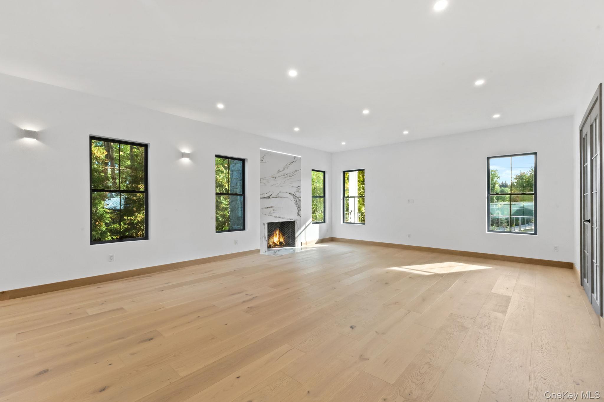 22 Whippoorwill Road East Armonk, NY 10504 - Photo 12 of 47 an empty room with windows