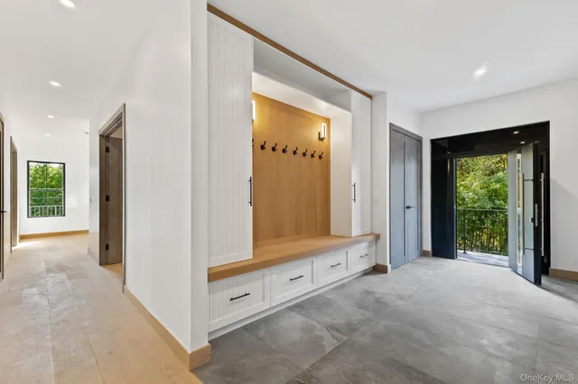 a view of an empty room and glass door