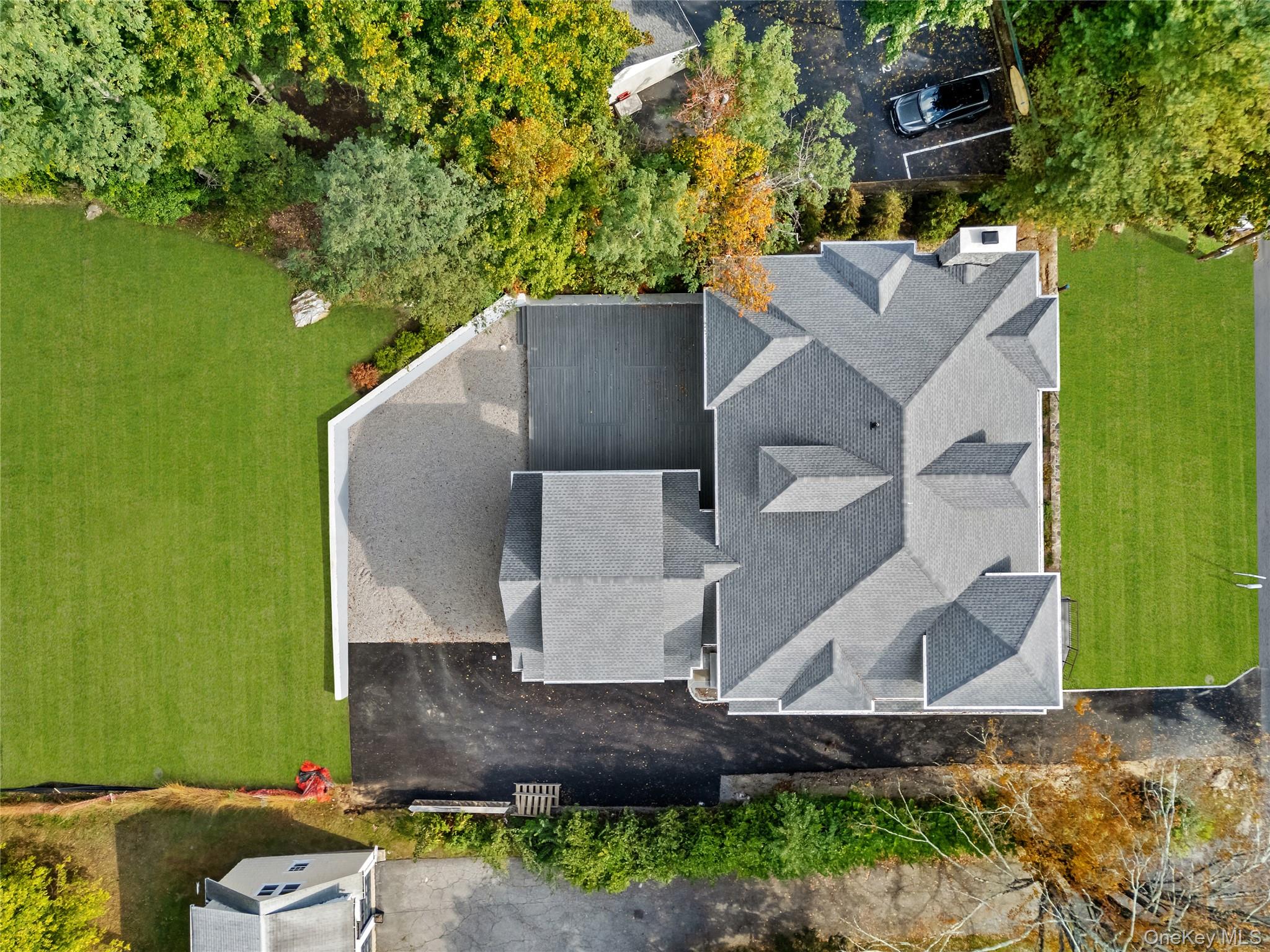 22 Whippoorwill Road East Armonk, NY 10504 - Photo 3 of 47 an aerial view of a house with a yard