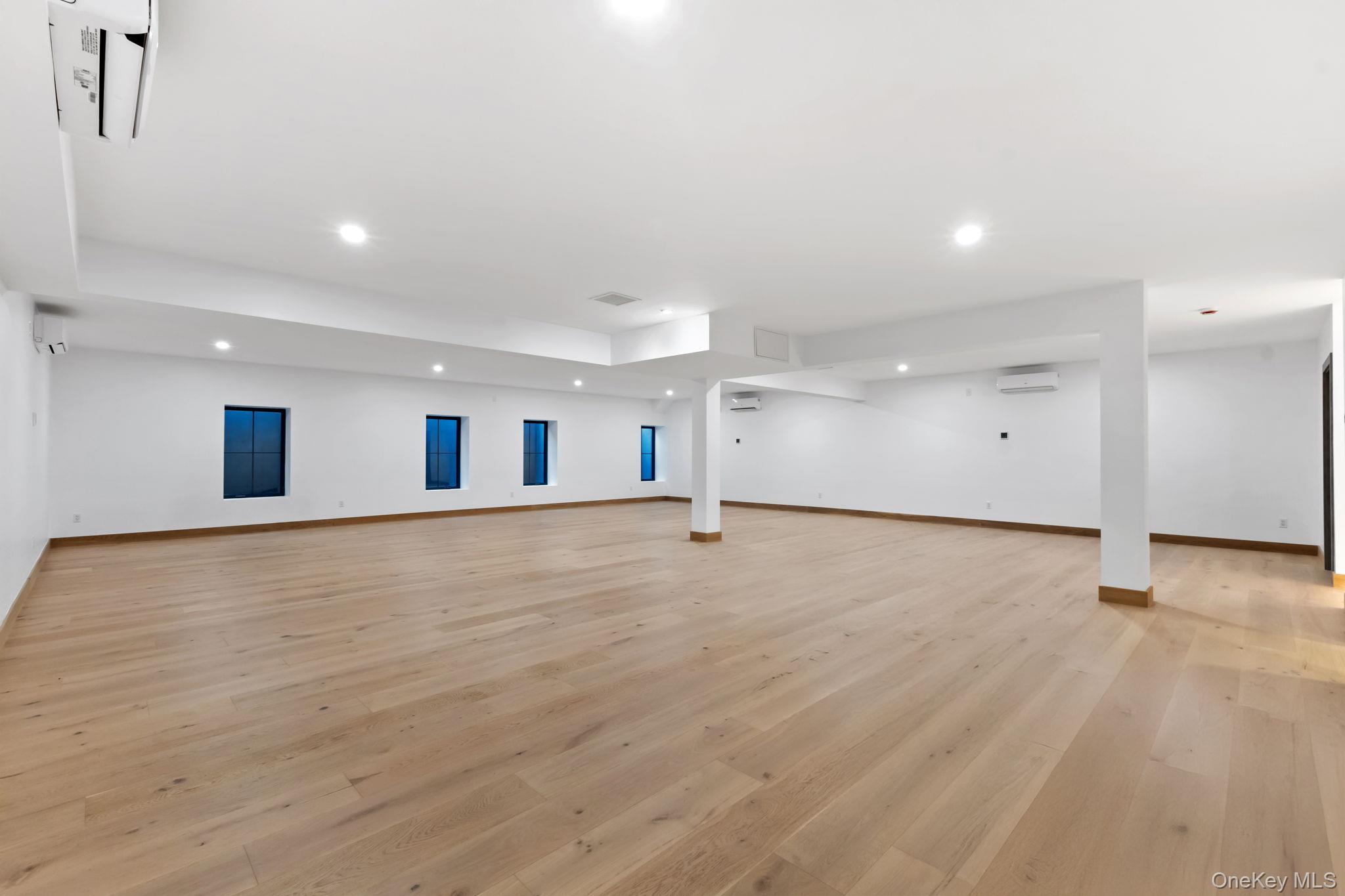22 Whippoorwill Road East Armonk, NY 10504 - Photo 31 of 47 a view of an empty room