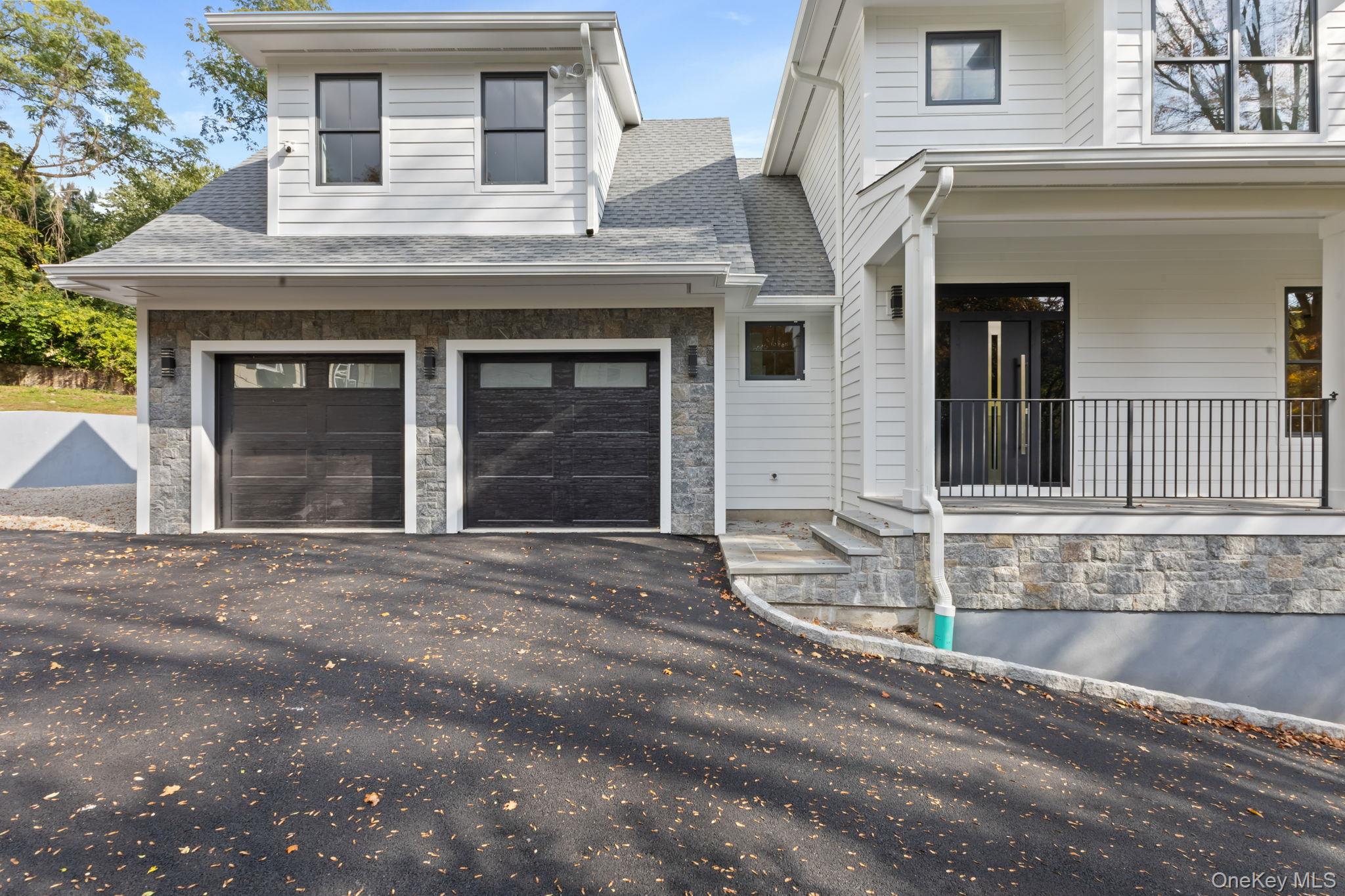 22 Whippoorwill Road East Armonk, NY 10504 - Photo 33 of 47 a bathroom with a granite countertop sink