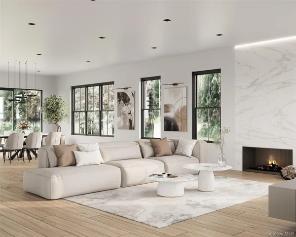 a kitchen with stainless steel appliances kitchen island granite countertop a sink a stove and a refrigerator