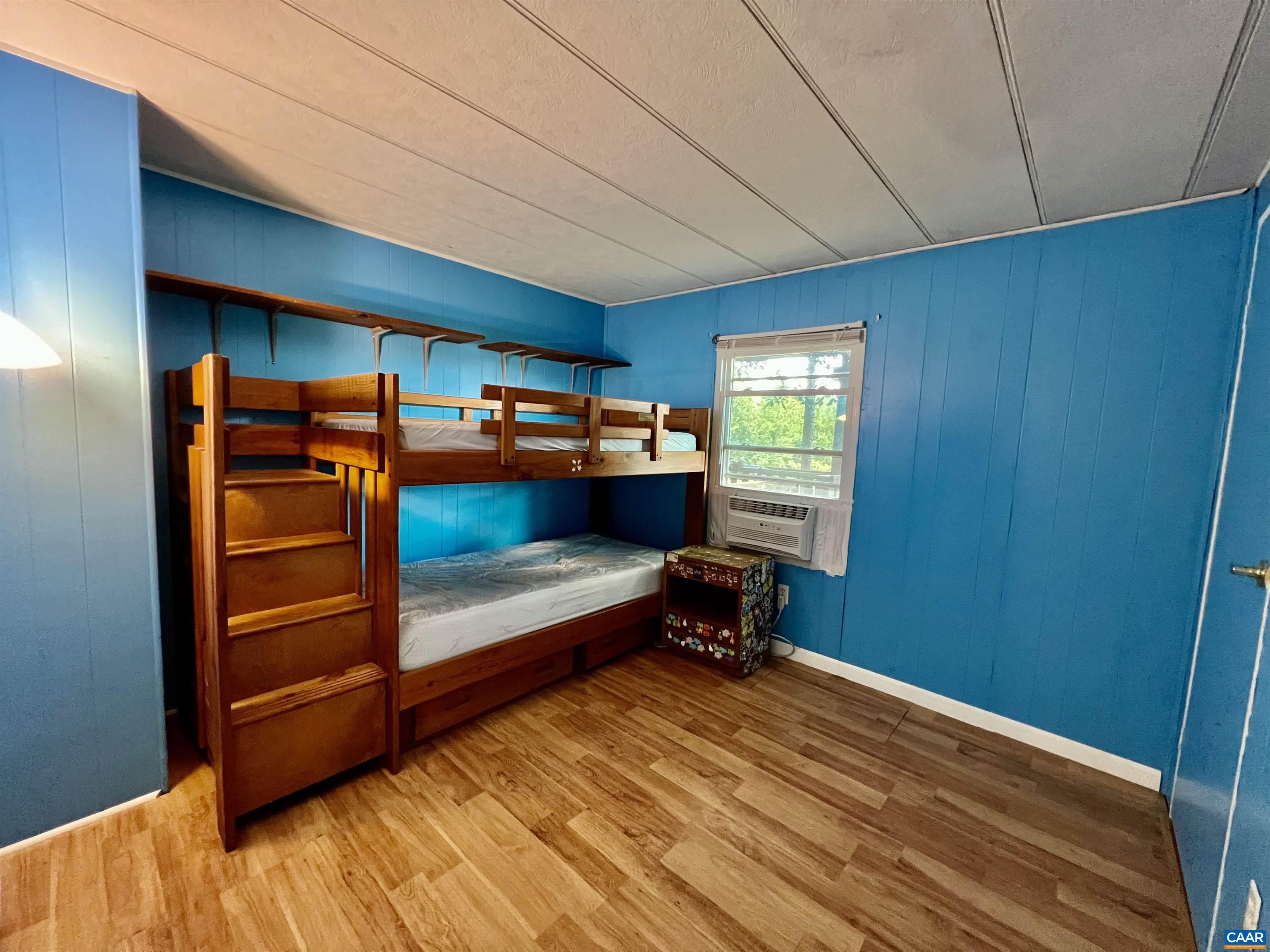 6790 Foster Ridge Charlottesville, VA 22903 - Photo 20 of 43 a bedroom with furniture and a window