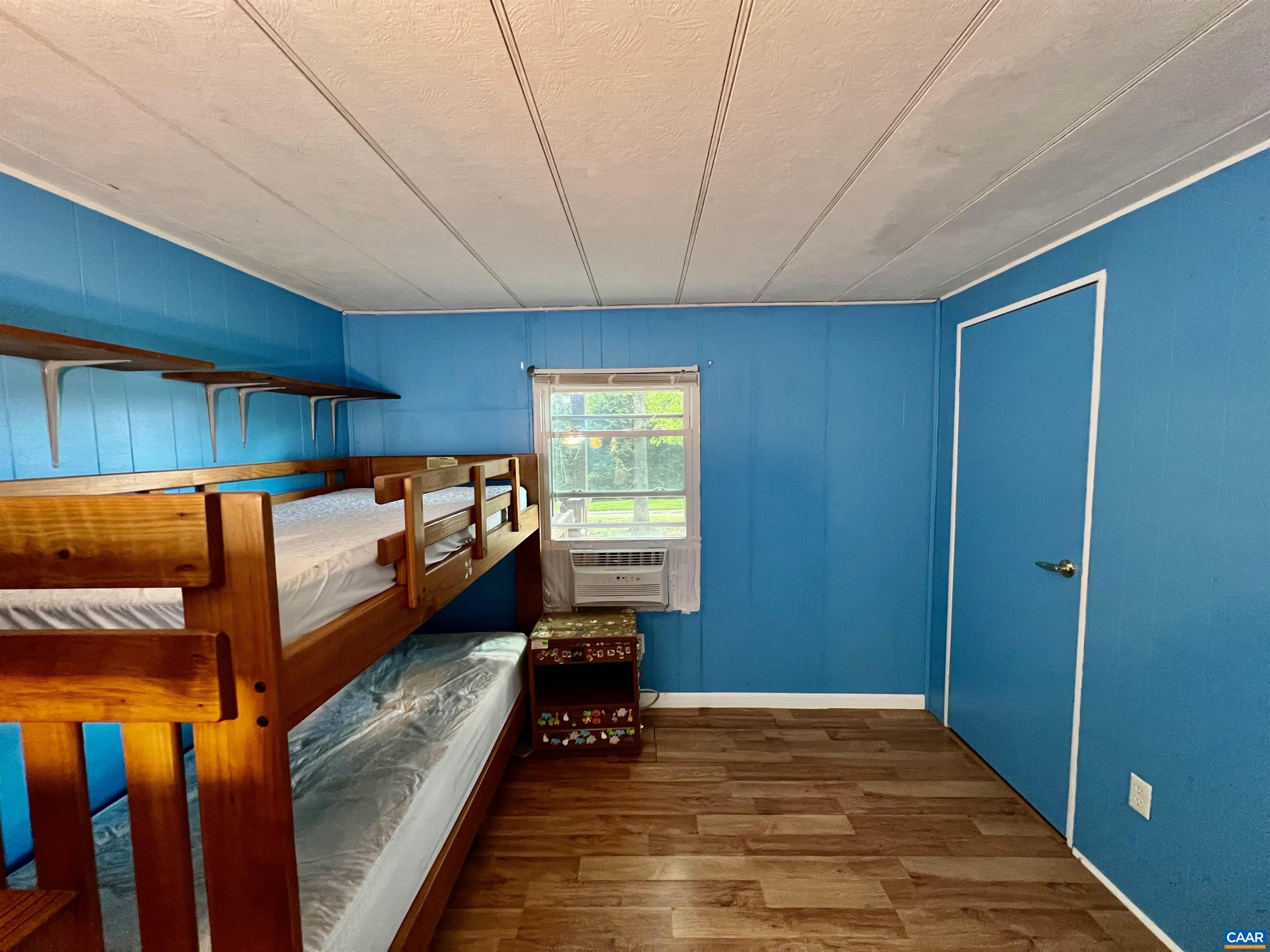 6790 Foster Ridge Charlottesville, VA 22903 - Photo 21 of 43 a view of a room with wooden floor