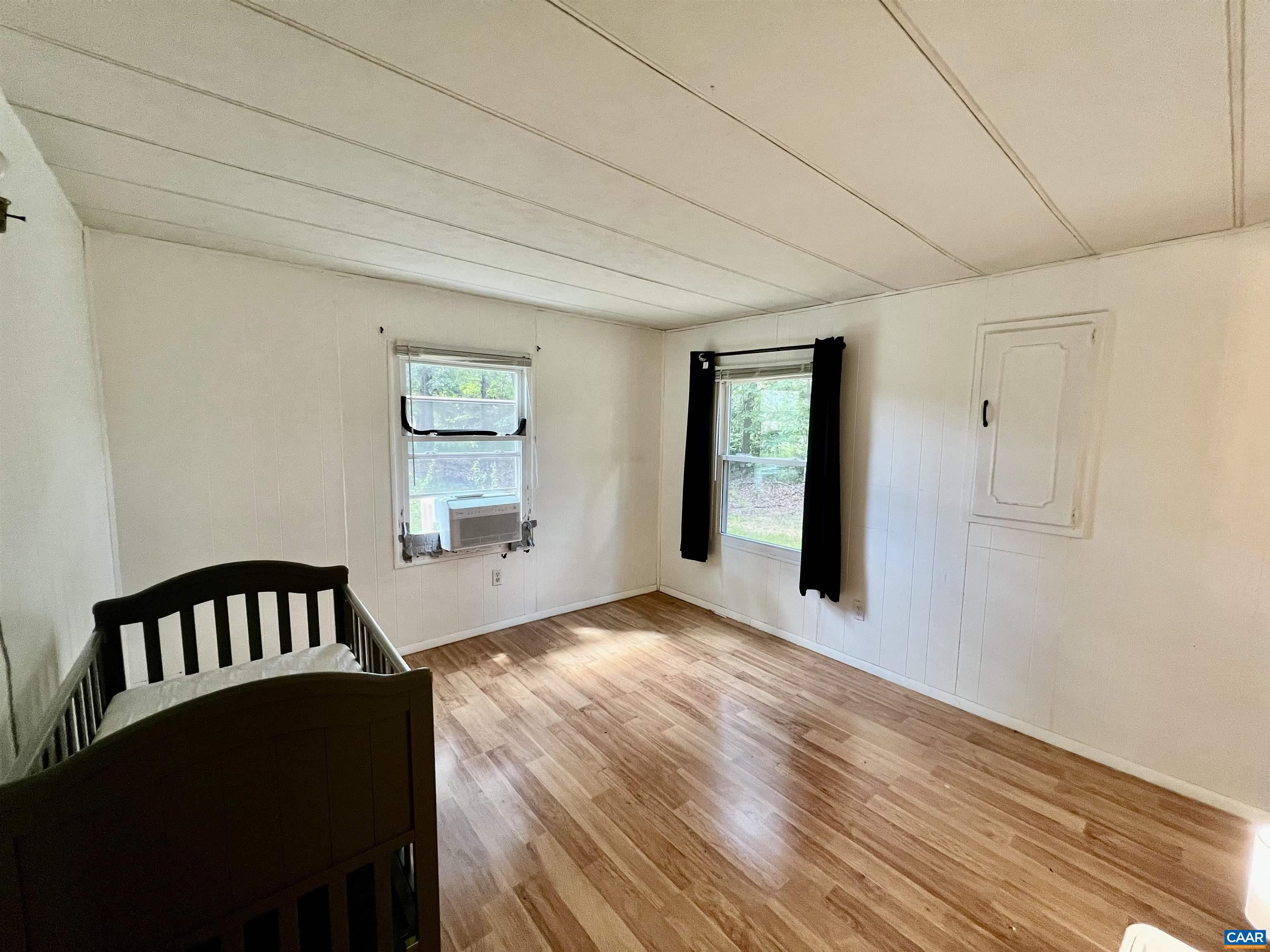 6790 Foster Ridge Charlottesville, VA 22903 - Photo 22 of 43 a view of a livingroom with wooden floor and staircase