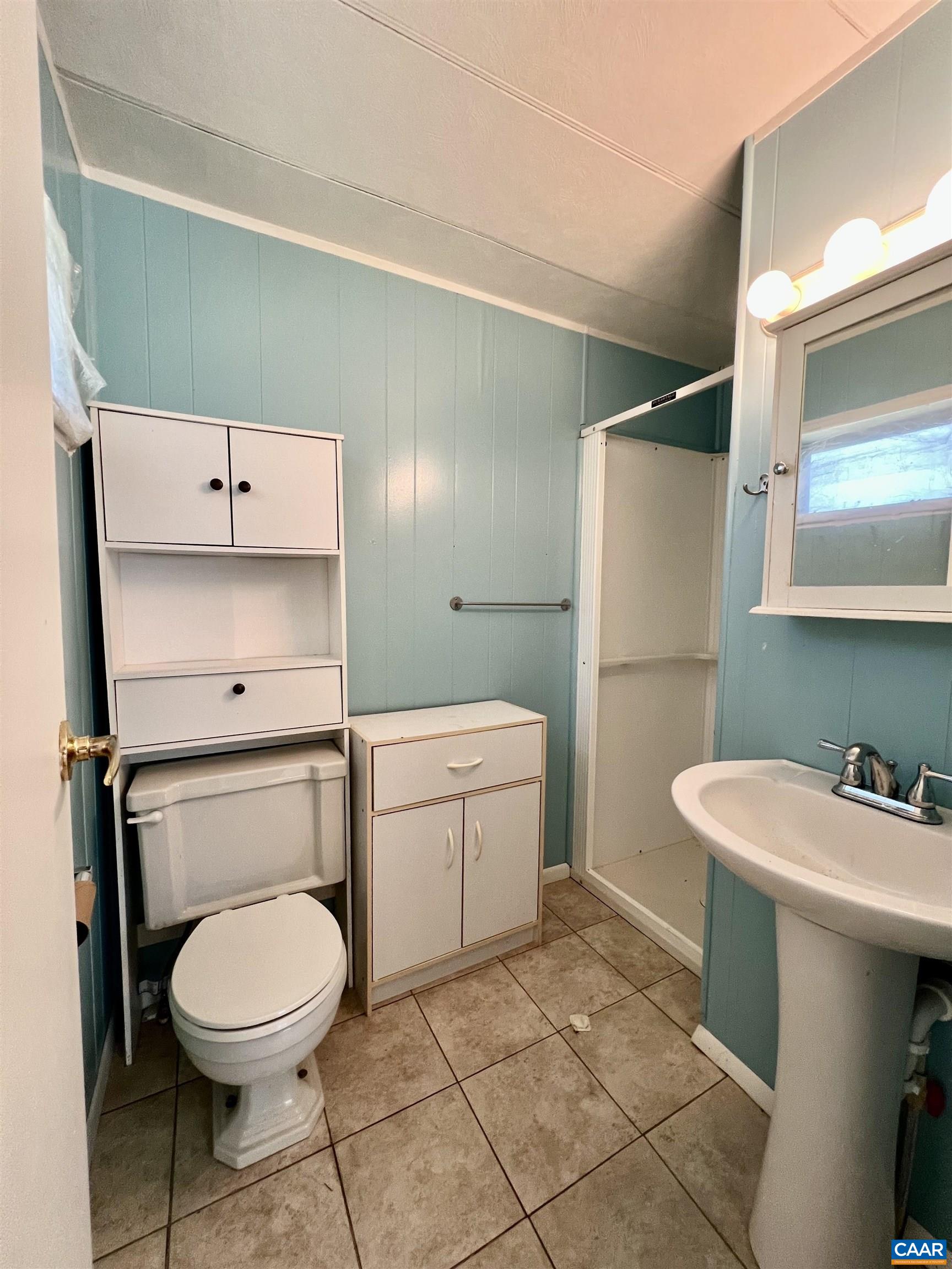 6790 Foster Ridge Charlottesville, VA 22903 - Photo 24 of 43 a bathroom with a toilet sink and mirror