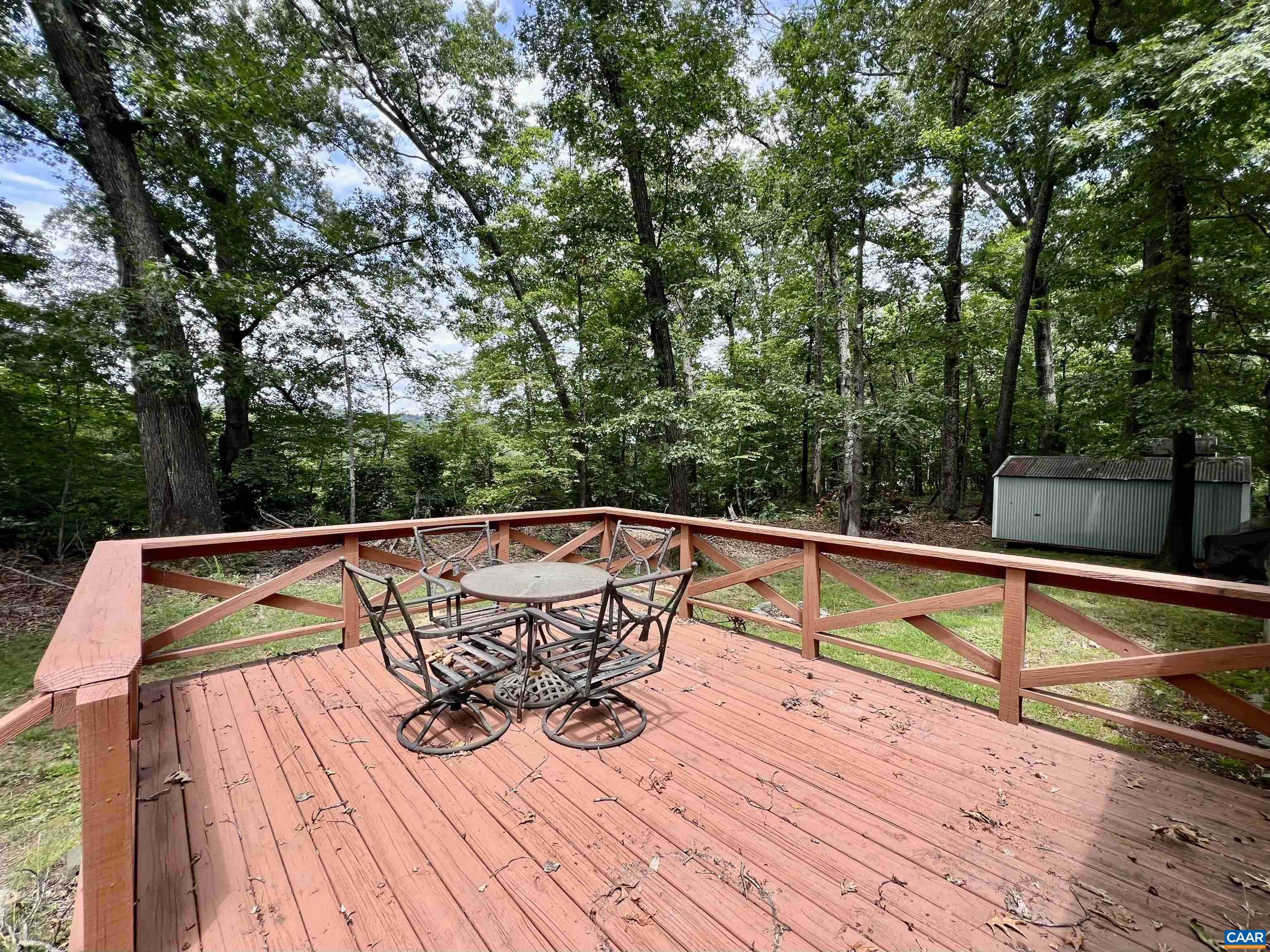 6790 Foster Ridge Charlottesville, VA 22903 - Photo 25 of 43 a view of deck with chairs and wooden floor