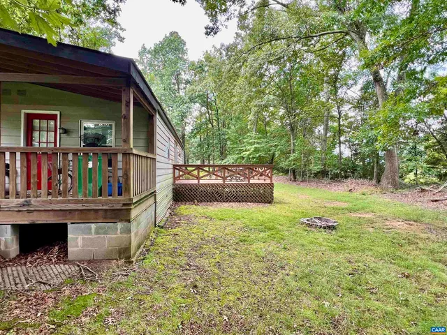a view of house with roof deck