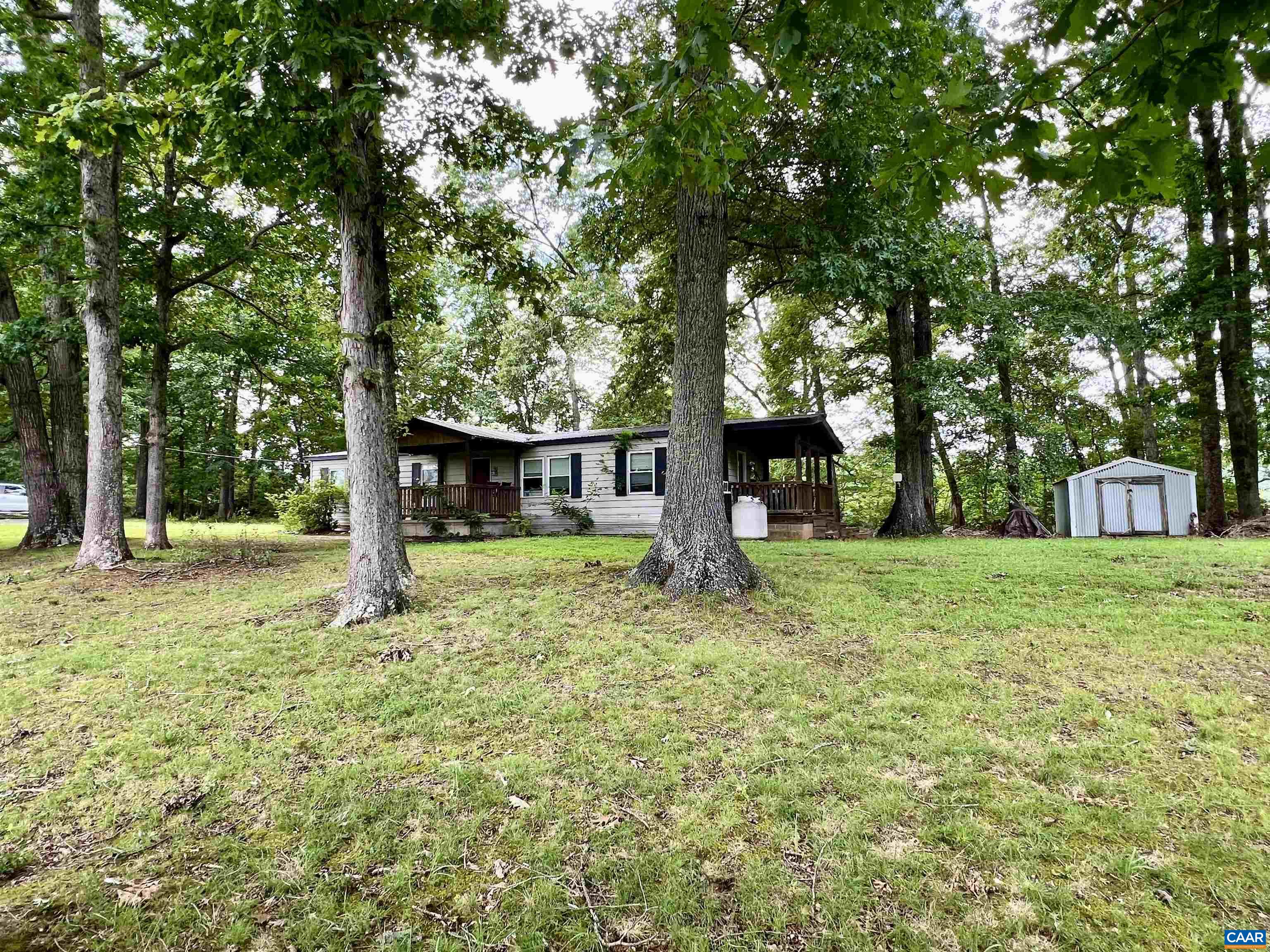 6790 Foster Ridge Charlottesville, VA 22903 - Photo 36 of 43 a view of a house with a yard