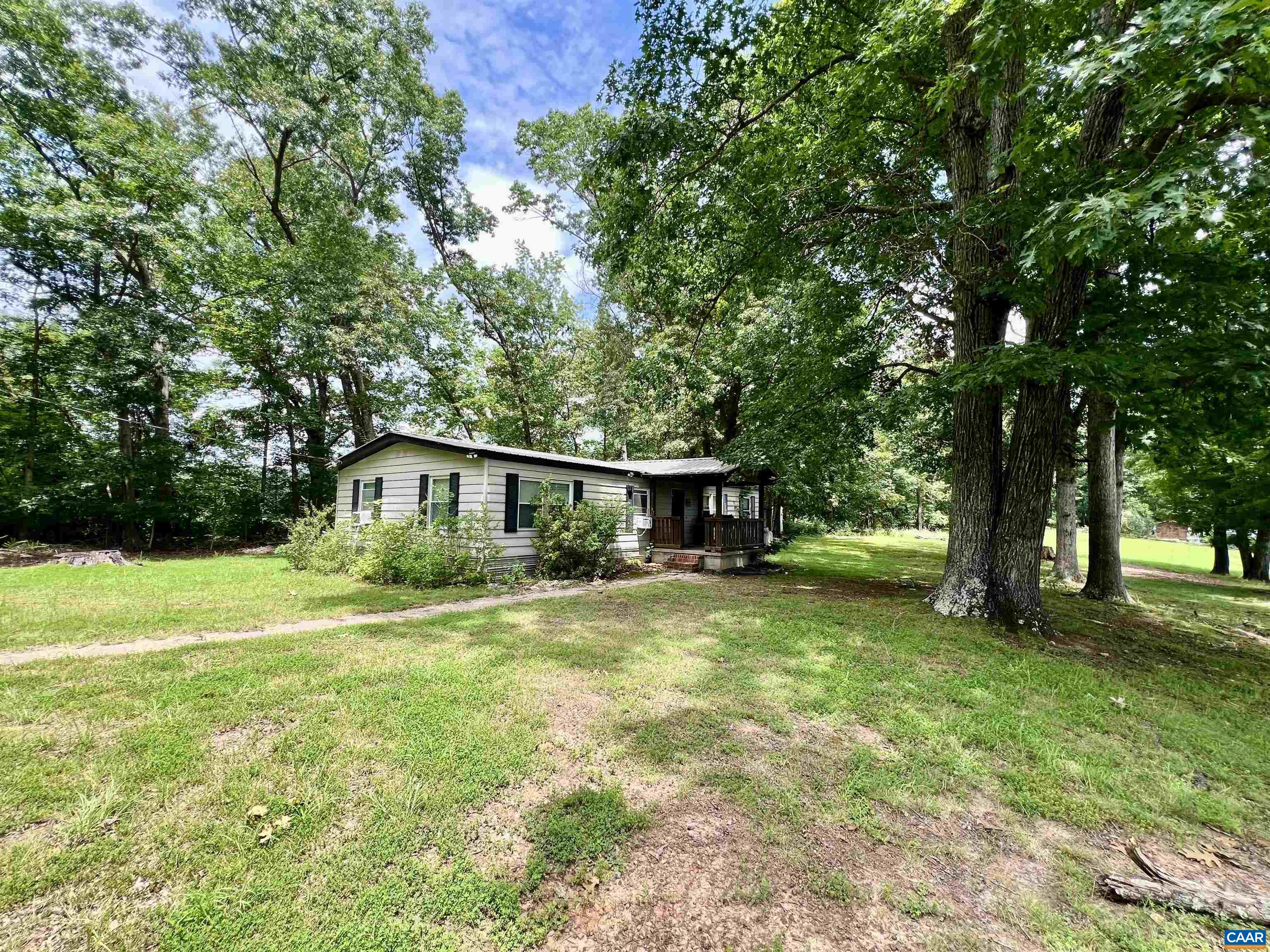 6790 Foster Ridge Charlottesville, VA 22903 - Photo 38 of 43 a view of a house with a yard and tree s