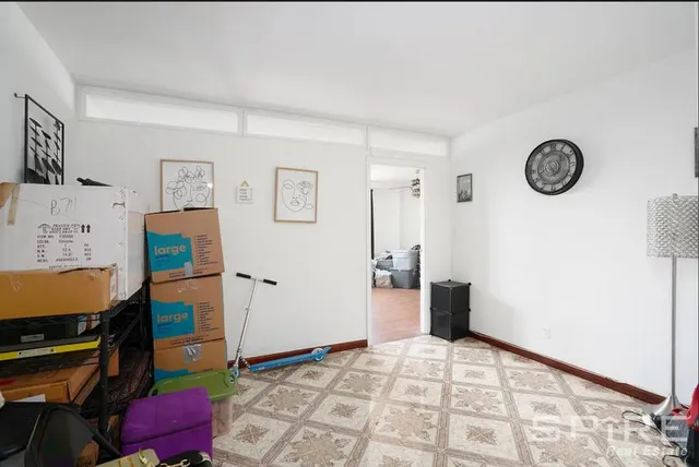 a view of a workspace with furniture