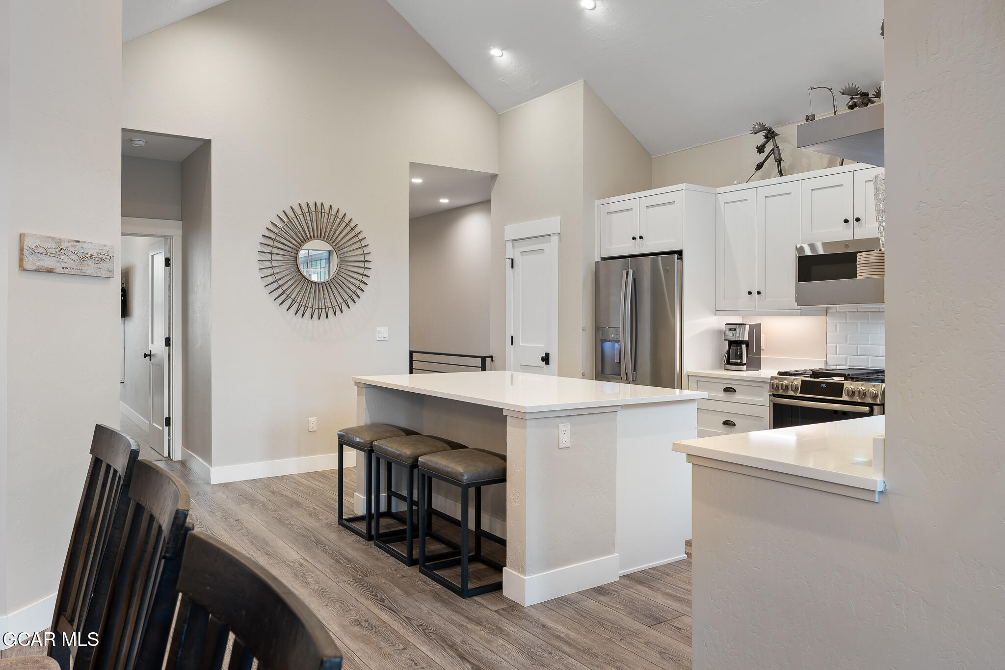 74 Eagle Ridge Drive Granby, CO 80446 - Photo 13 of 44 a kitchen with a sink stainless steel appliances and cabinets