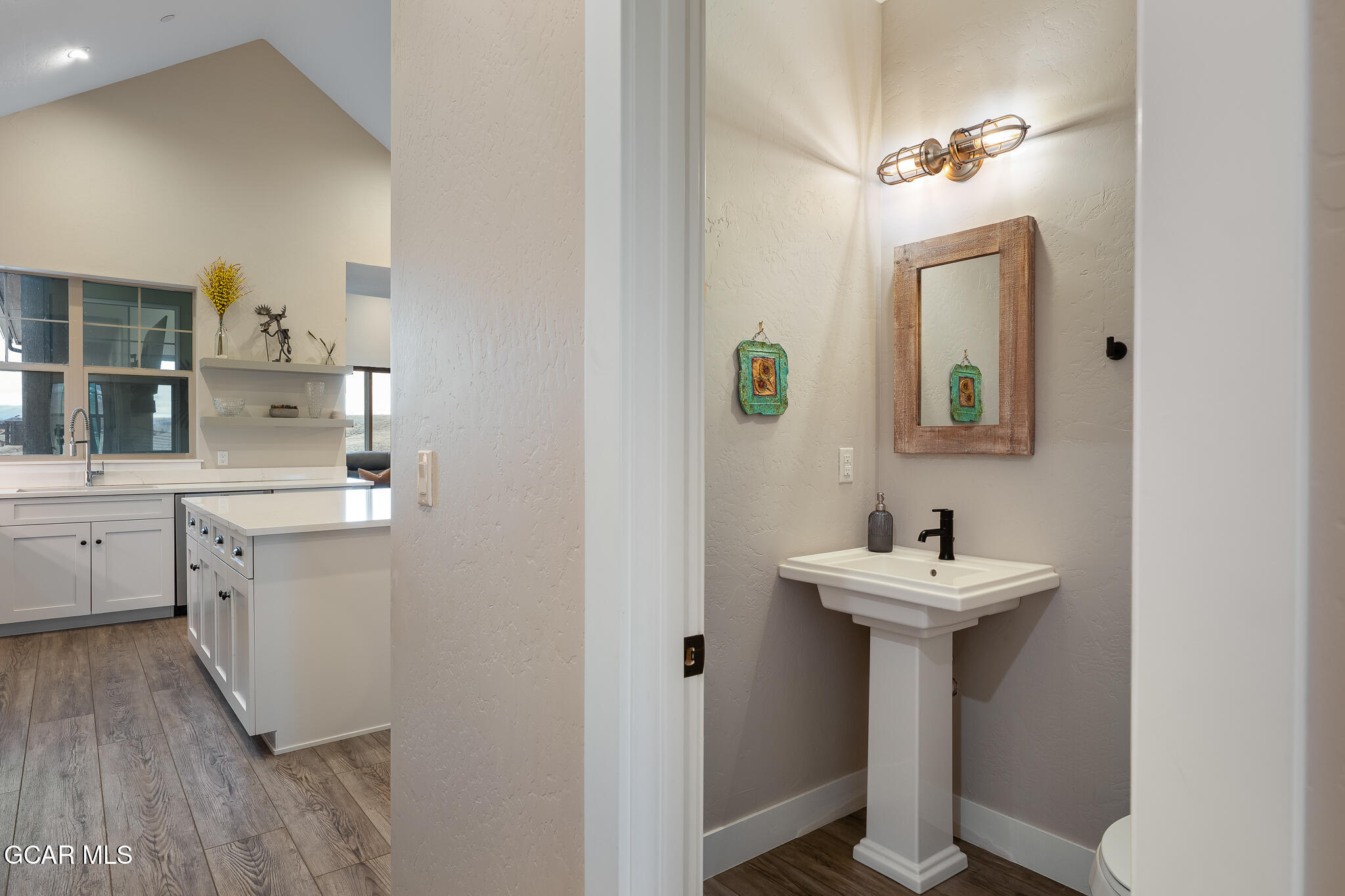 74 Eagle Ridge Drive Granby, CO 80446 - Photo 18 of 44 a bathroom with a sink and a mirror