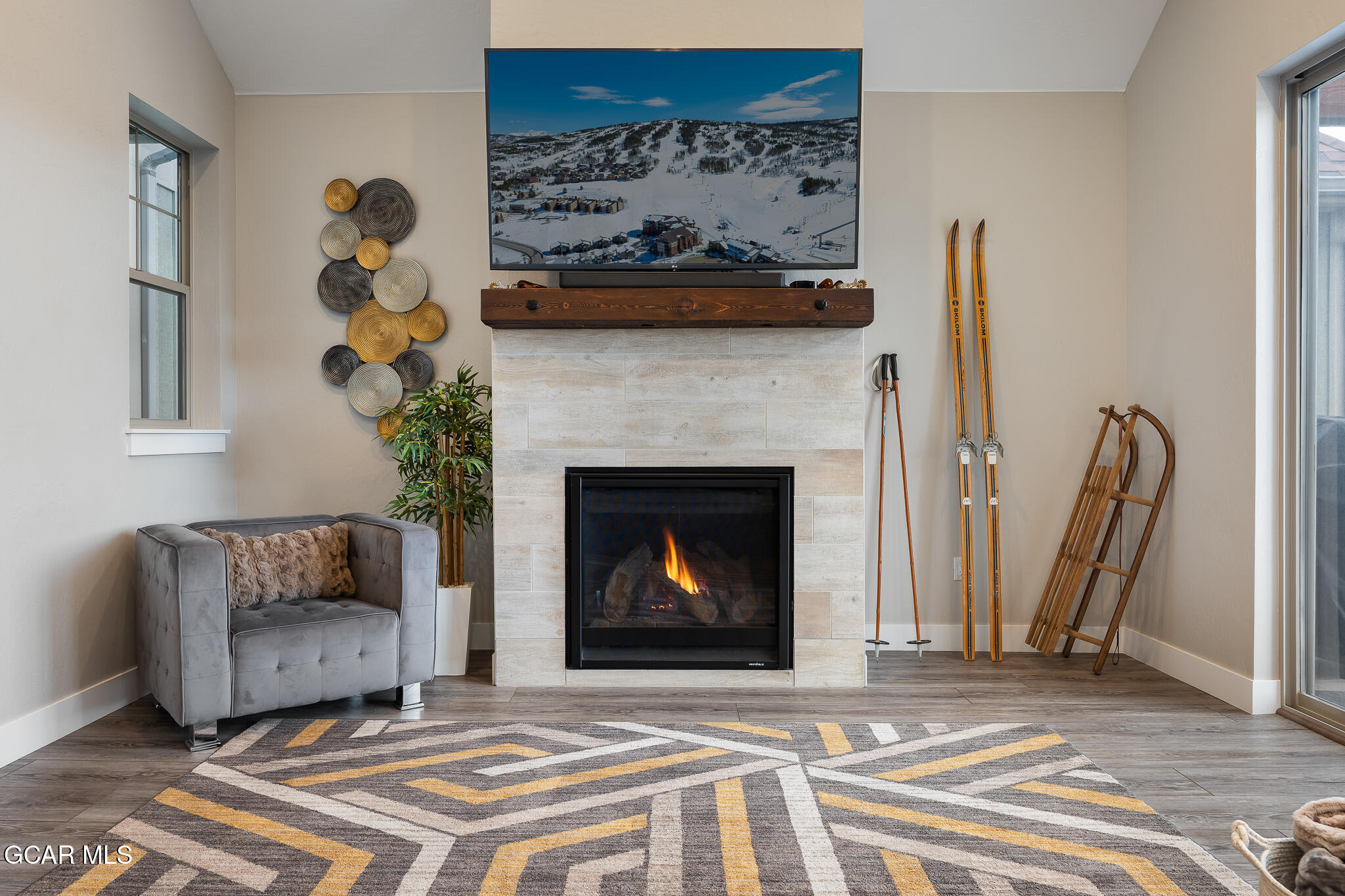 74 Eagle Ridge Drive Granby, CO 80446 - Photo 2 of 44 a living room with furniture and a fireplace