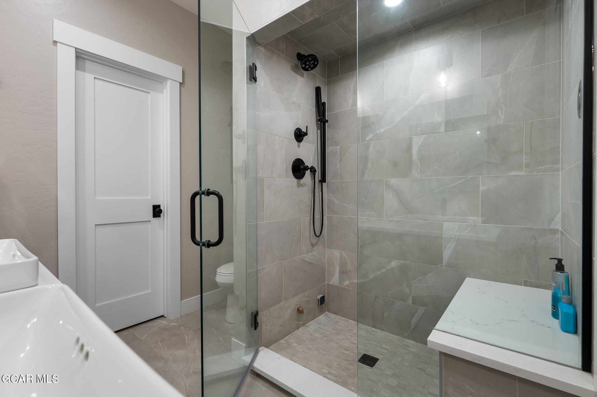 74 Eagle Ridge Drive Granby, CO 80446 - Photo 22 of 44 a bathroom with a shower and a sink