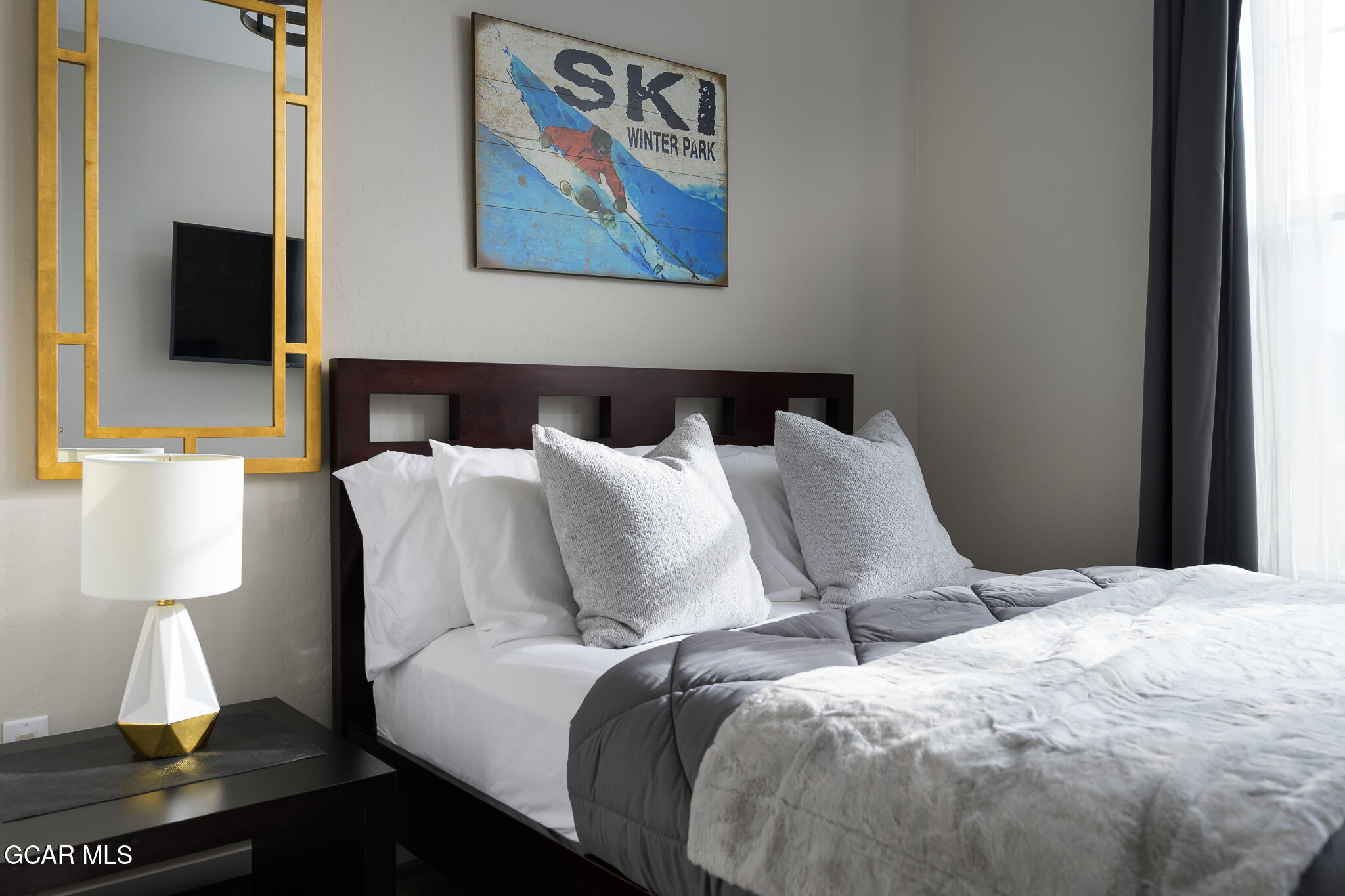 74 Eagle Ridge Drive Granby, CO 80446 - Photo 24 of 44 a bed room with two bed and a night stand