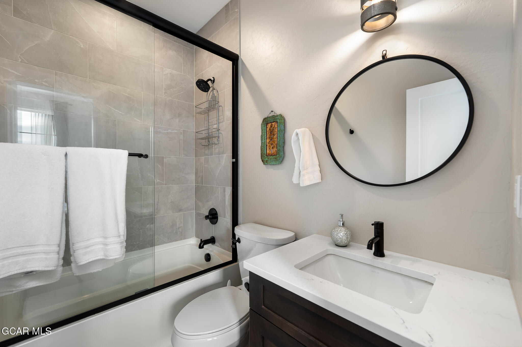 74 Eagle Ridge Drive Granby, CO 80446 - Photo 25 of 44 a bathroom with a sink toilet and shower