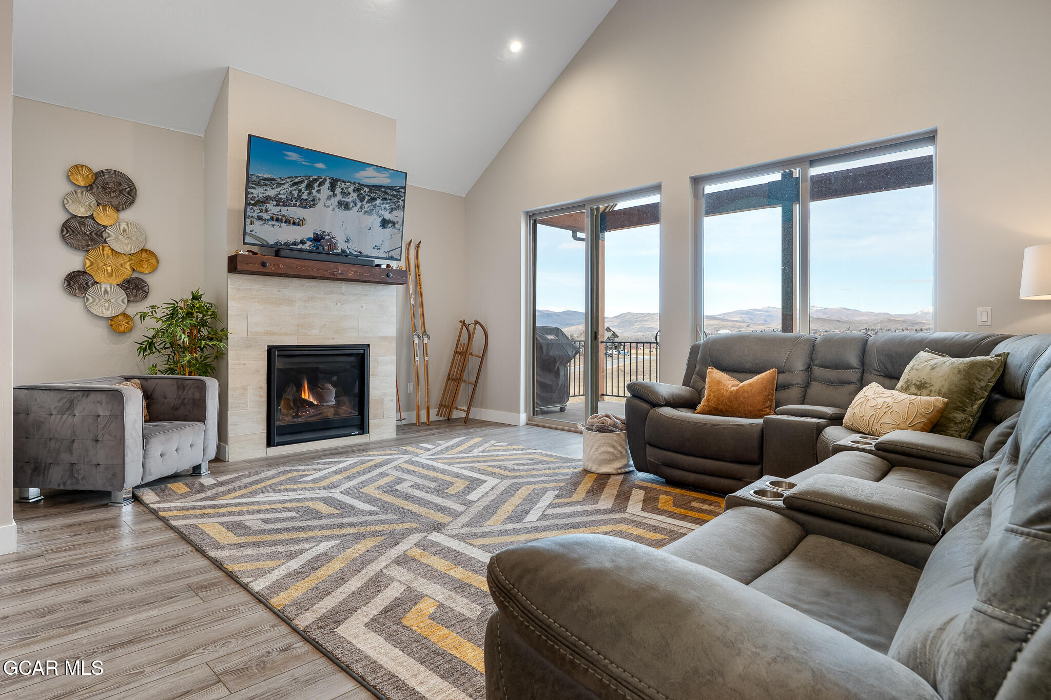 74 Eagle Ridge Drive Granby, CO 80446 - Photo 8 of 44 a living room with furniture and a fireplace