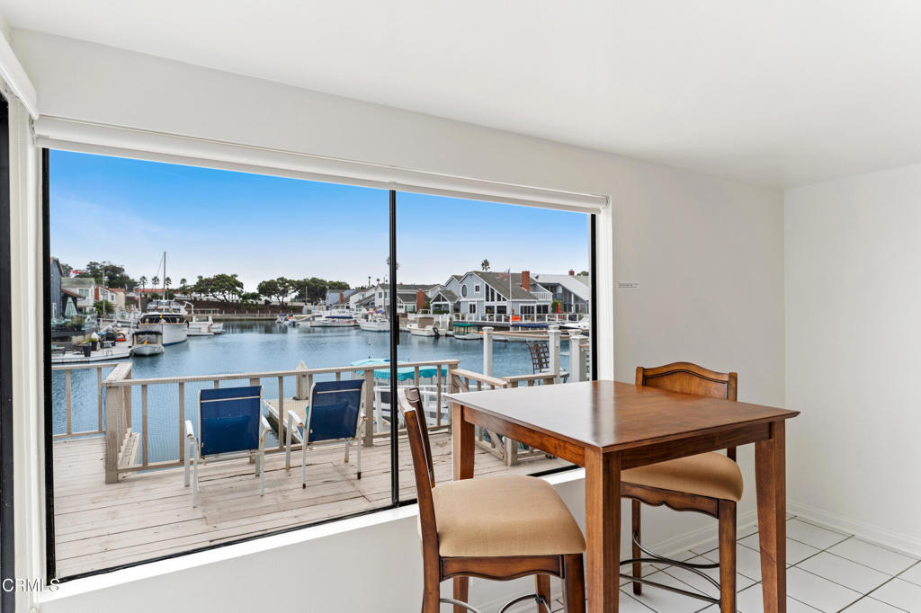 4320 Meridian Avenue Oxnard, CA 93035 - Photo 11 of 31 a dining room with a table and chairs